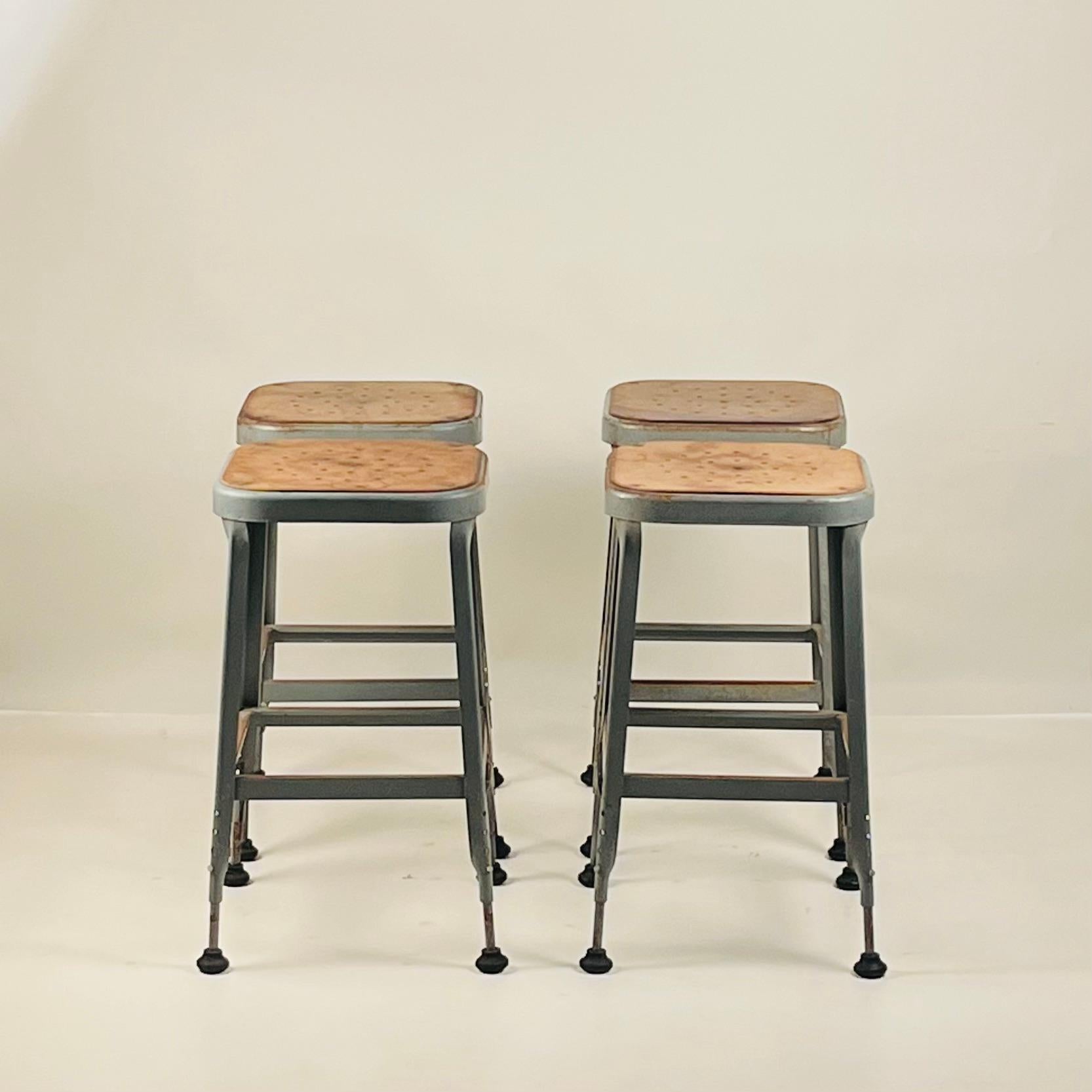 Set of 4 Adjustable Patinated Steel Counter Stools by Lyon Manufacturing For Sale 1