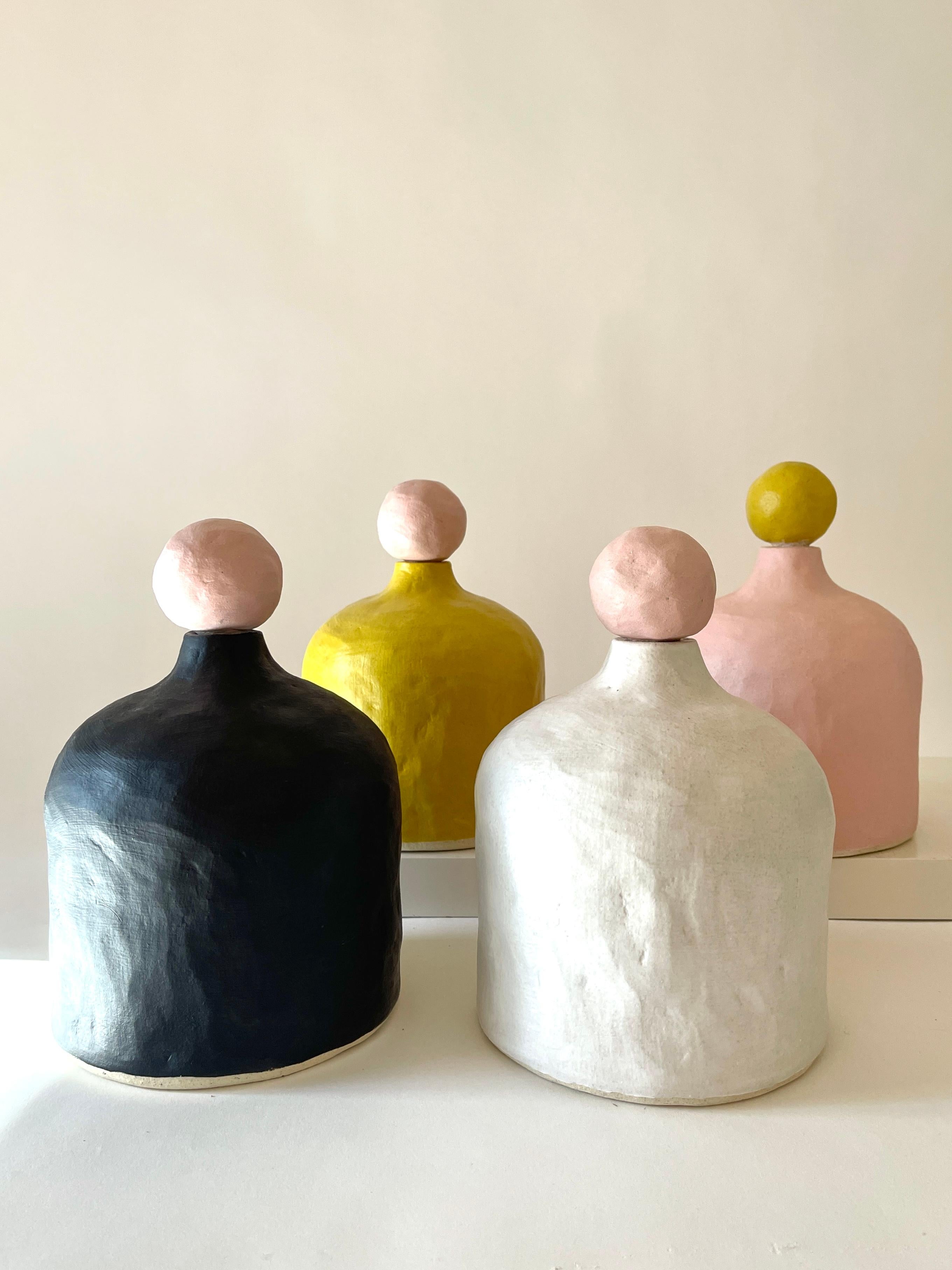 Set of 4 Annie Vases by Meg Morrison
One of a kind.
Materials: Ceramic.
Dimensions: D 15.5 x H 21.5 cm (each).

All sizes are approximate. Although vases are watertight condensation may form on the bottom. Please protect delicate surfaces.