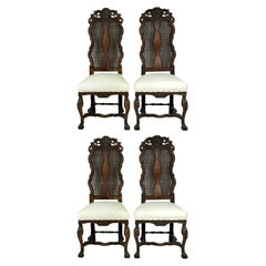  4 Anciennes chaises de style baroque hollandais en noyer sculpté et en bergère