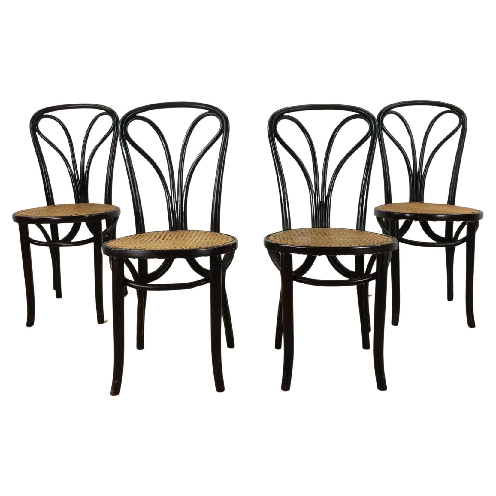Set of 4 Antique Bentwood Bistro Chairs with Caned Seats For Sale