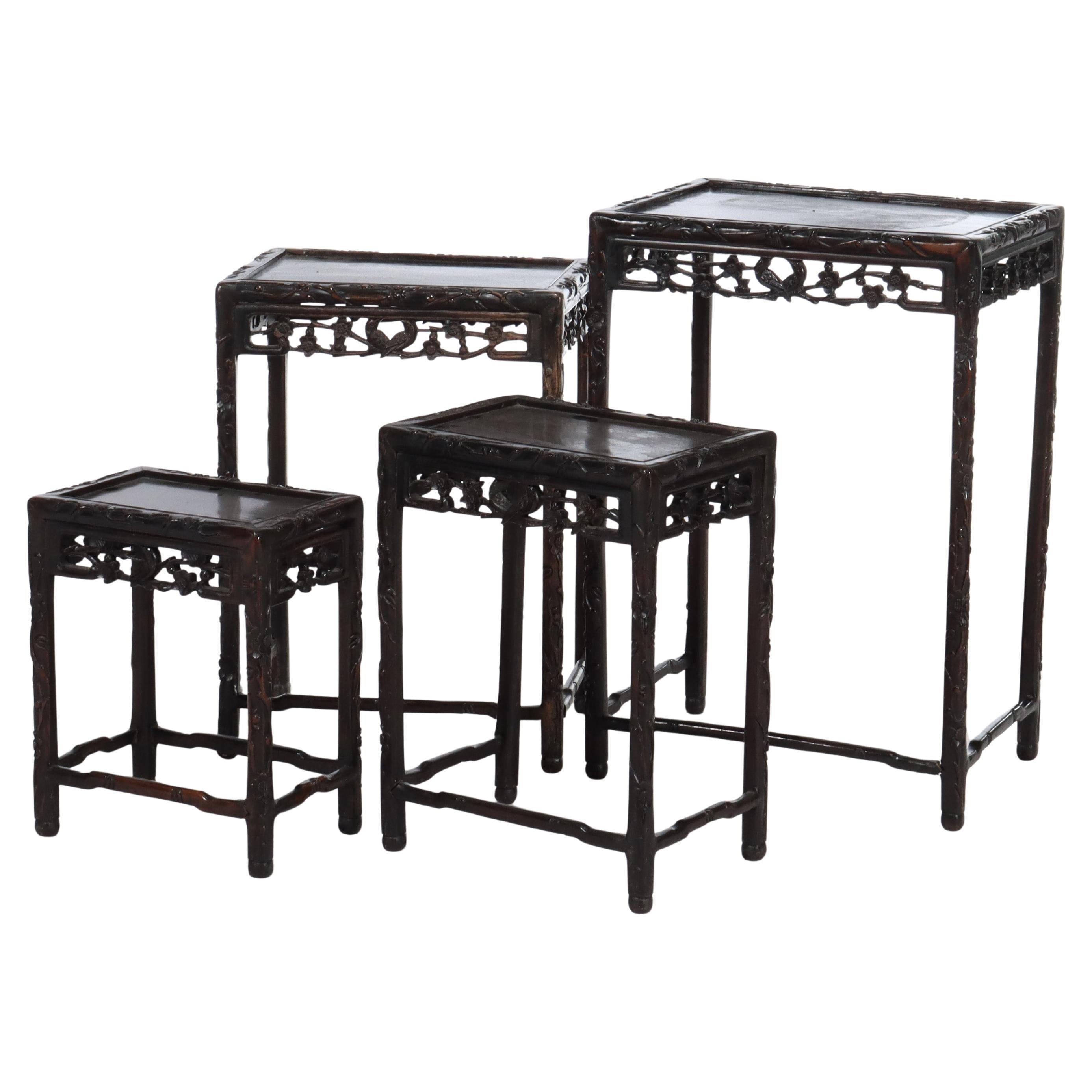 Set of 4 Antique Chinese Floral & Figural Carved Hardwood Nesting Tables For Sale