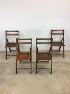 Ensemble de 4 chaises pliantes anciennes avec finition en chêne