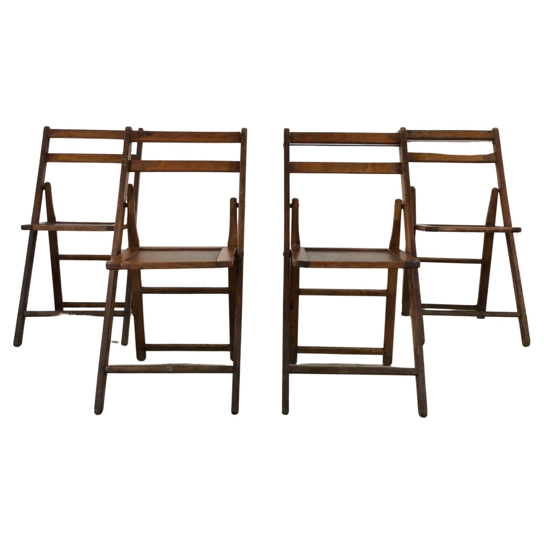 Ensemble de 4 chaises pliantes anciennes avec finition en chêne
