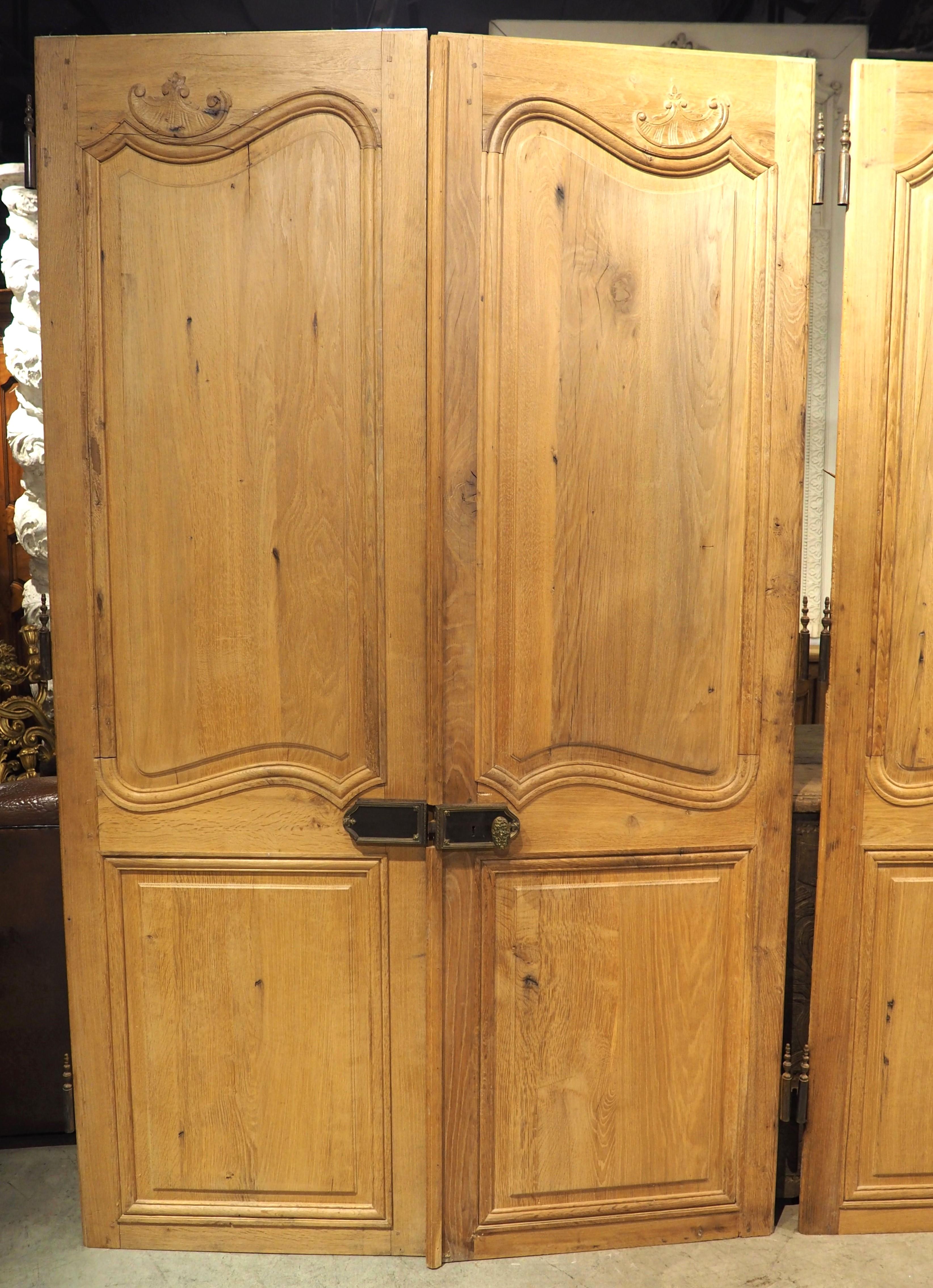 Hand-Carved Set of 4 Antique French Carved Oak Double Sided Interior Doors, 19th Century For Sale