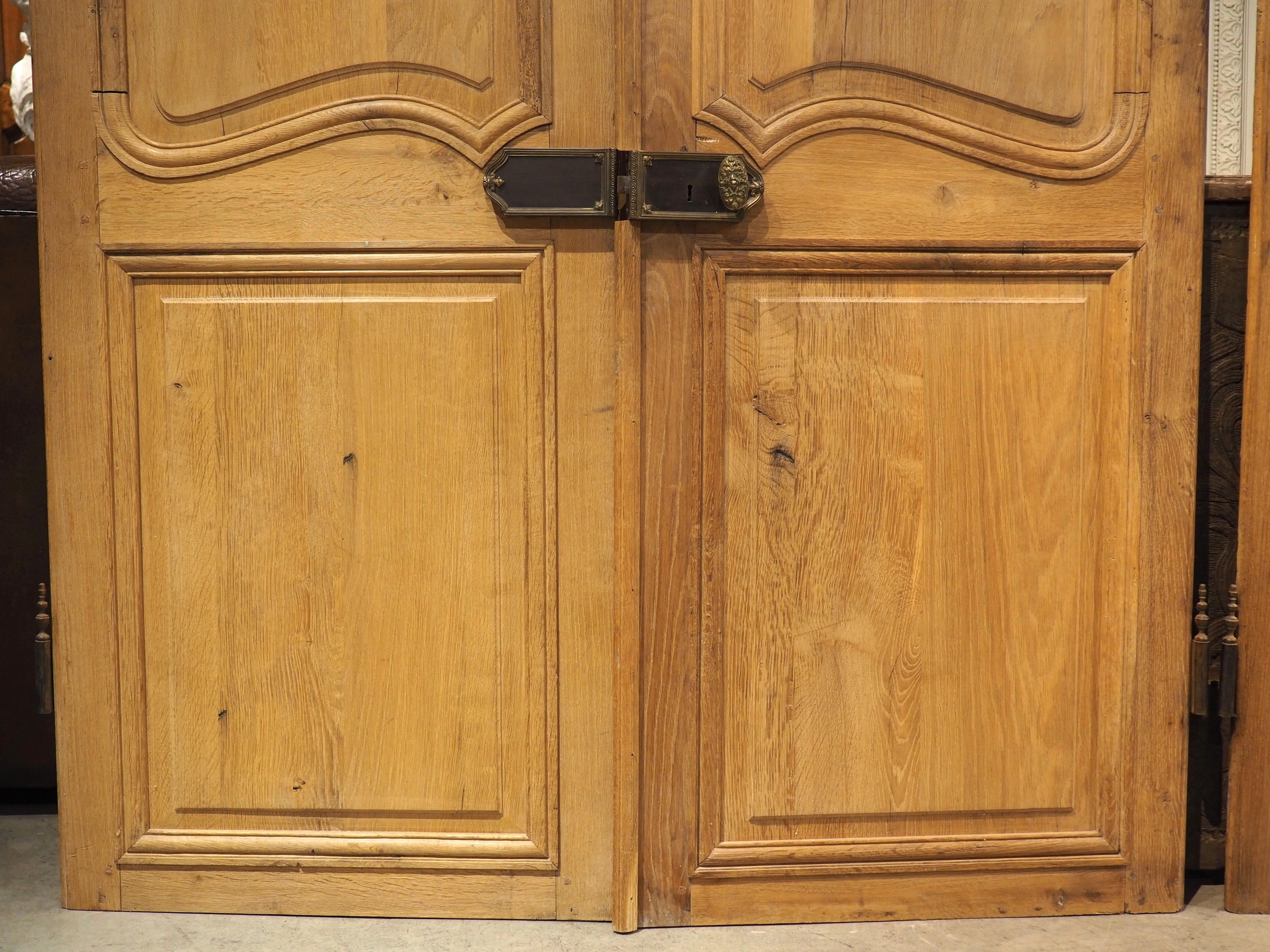 Set of 4 Antique French Carved Oak Double Sided Interior Doors, 19th Century In Good Condition For Sale In Dallas, TX