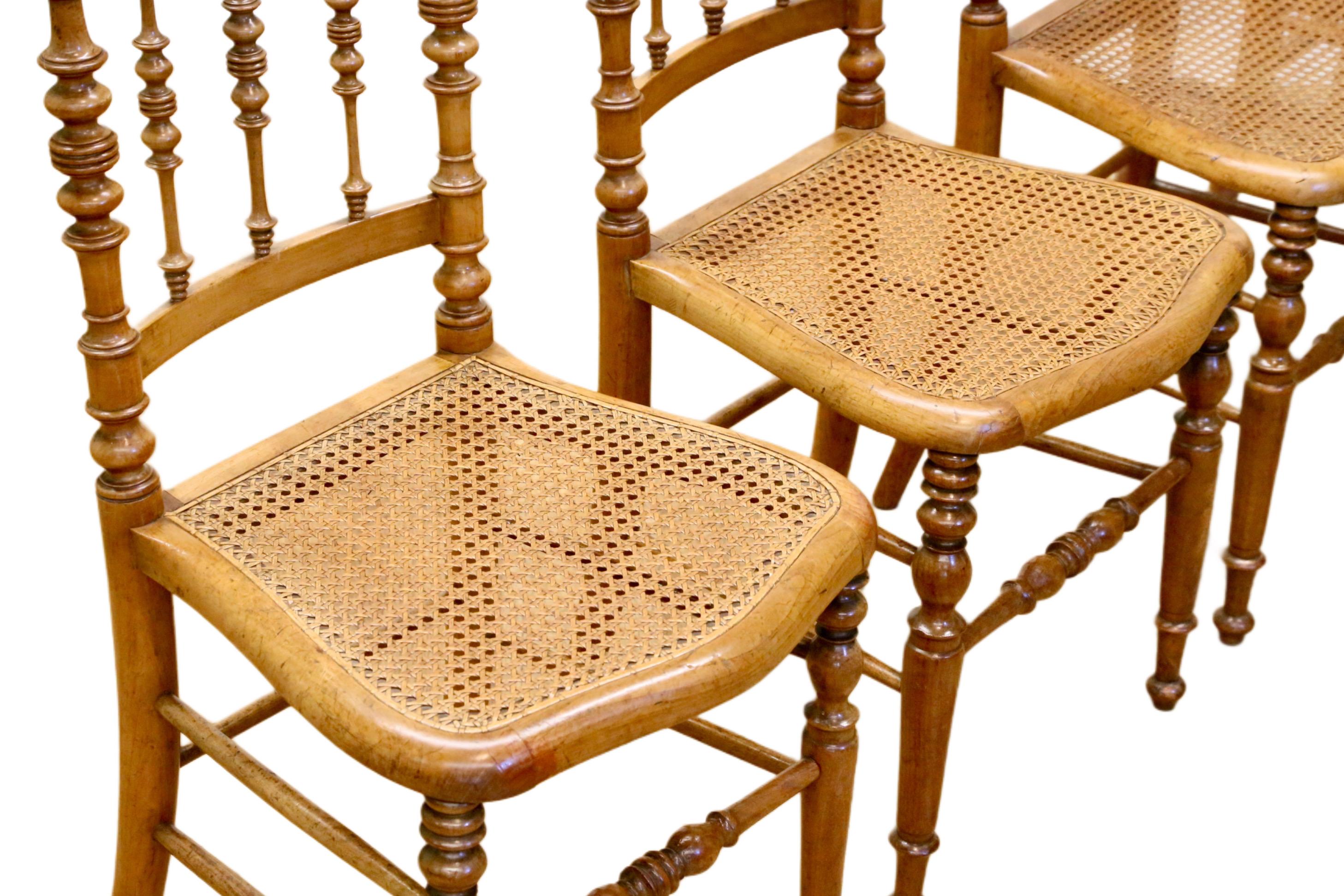 Hand-Carved Set of 4 Antique Hitchcock, Alford & Co. Walnut Cane Seat Dining Chairs For Sale