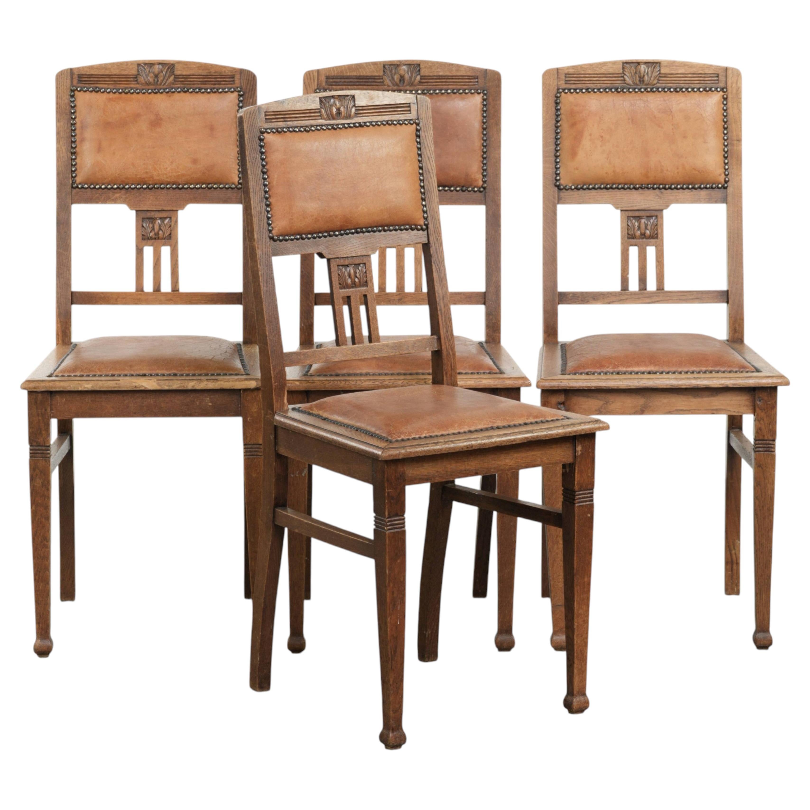 Set of 4 antique oak dining chairs in Art Nouveau style with sheepskin