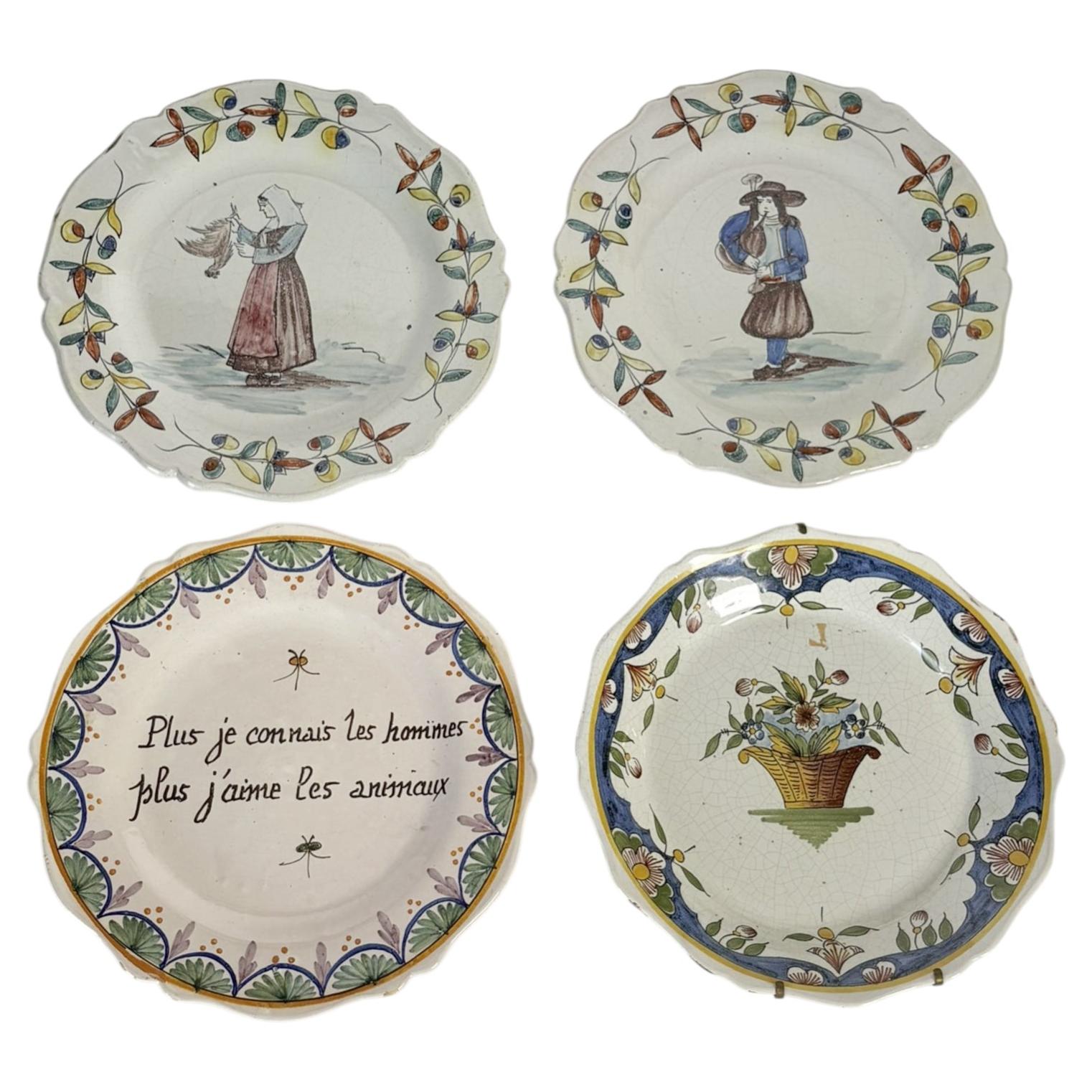 Set of 4 antique pottery plates, decorative motifs, France, early 20th century
