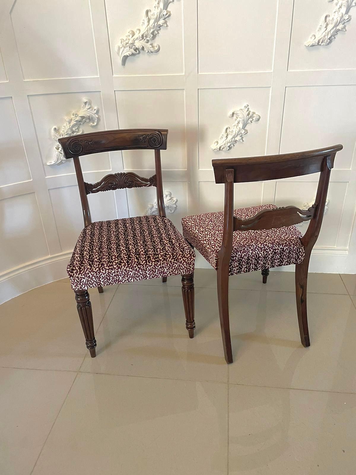 Set of 4 antique regency quality carved mahogany dining chairs having a quality carved mahogany top with a carved mahogany splat to the centre, newly reupholstered seats in a quality fabric standing on turned reeded tapering legs to the front and