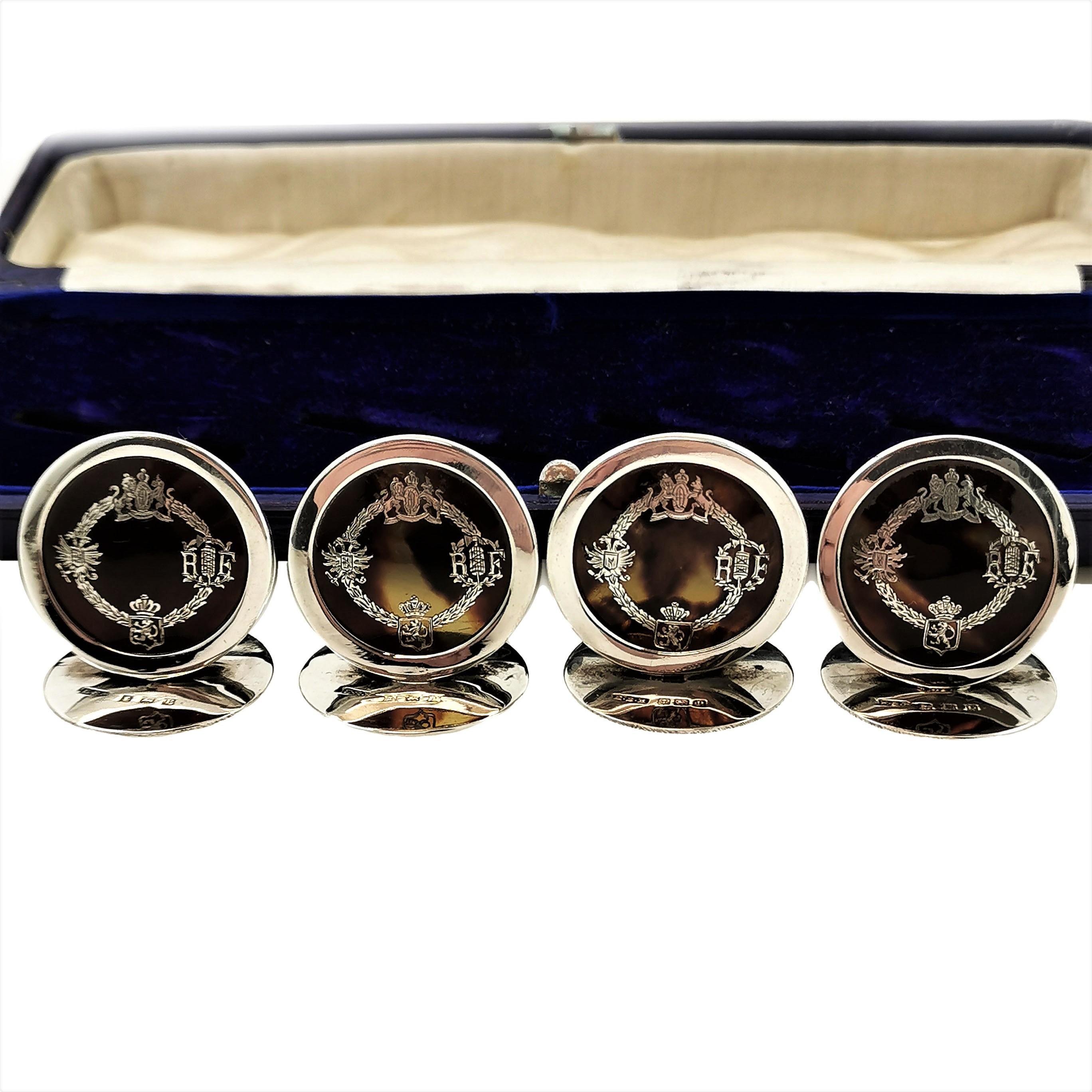 A set of four Antique Silver Menu Holders / Place Card Holders presented in their original fitted case. These round Silver Menu Holders have tortoise shell inserts that are further embellished with a delicate sterling silver design. This design is a