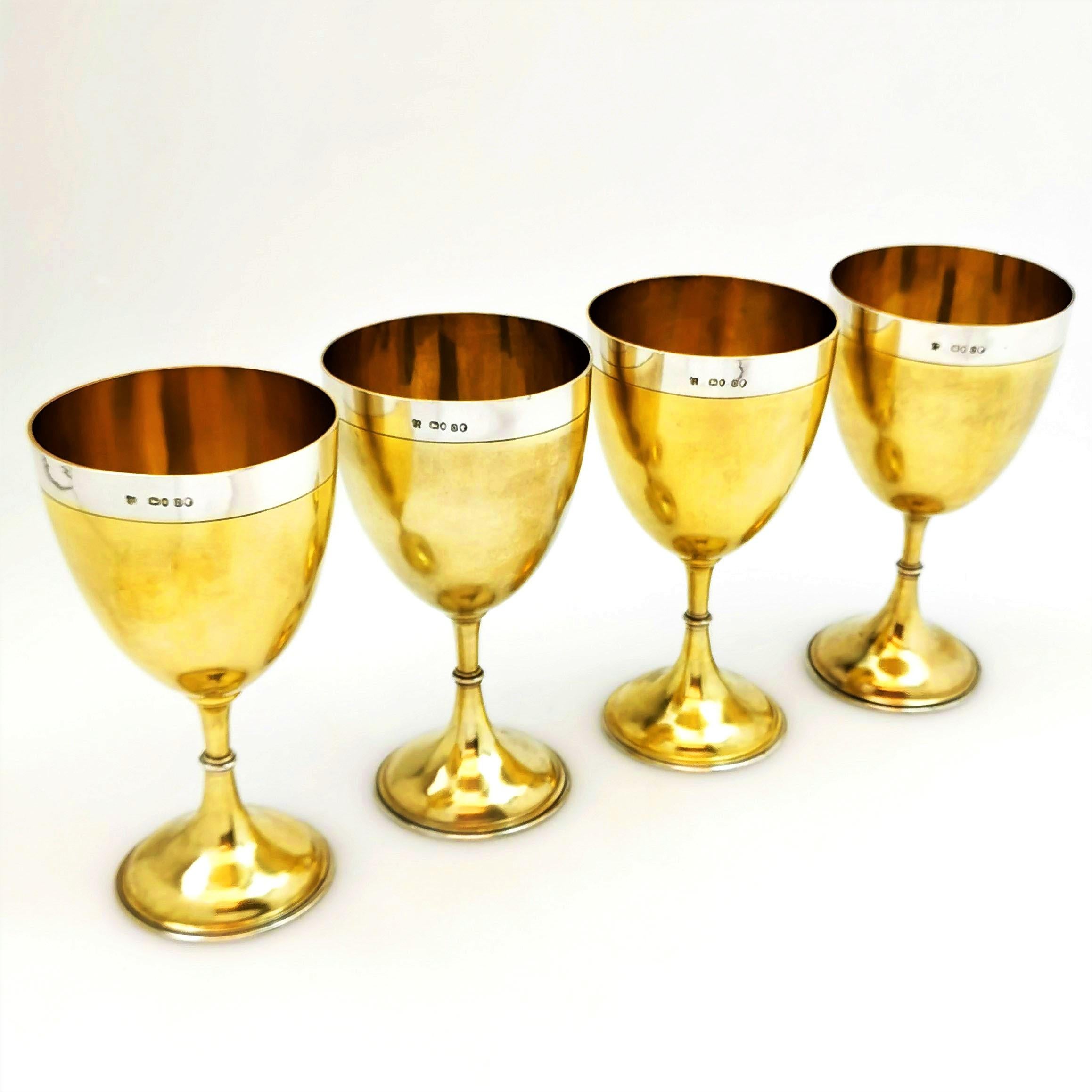 A set of beautiful Victorian Solid Silver Wine Goblets. These antique Goblets have an elegant parcel gilt design, with a subtle lemon gilt exterior and interior, topped with a polished plain silver band at the top. The Goblets are of a substantial
