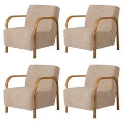 Ensemble de 4 chaises longues en forme d'arche en chêne et tapisserie en peau de mouton par Mazo Design
