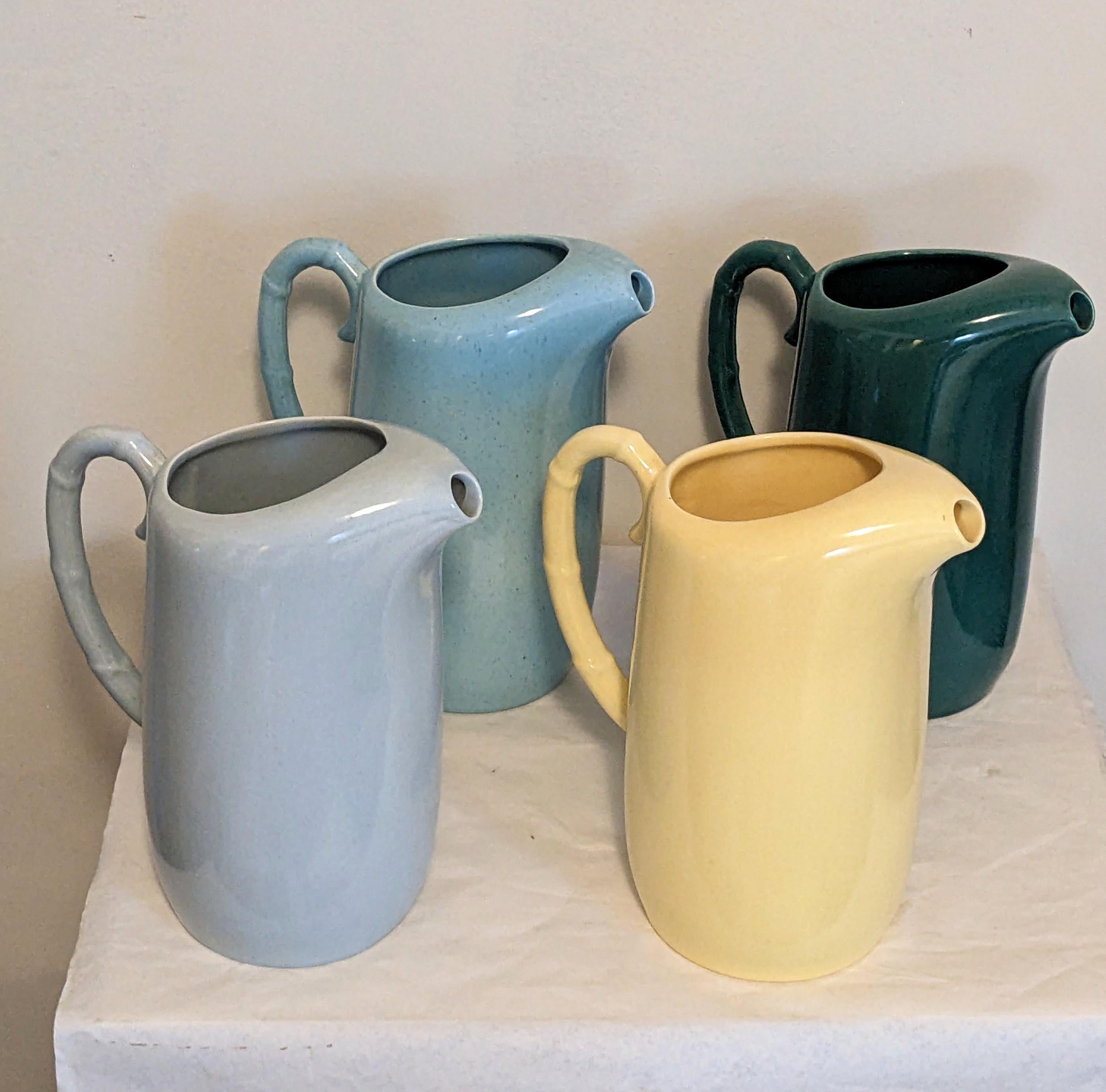 Pottery Set of 4 Art Deco Colorful Pitchers For Sale