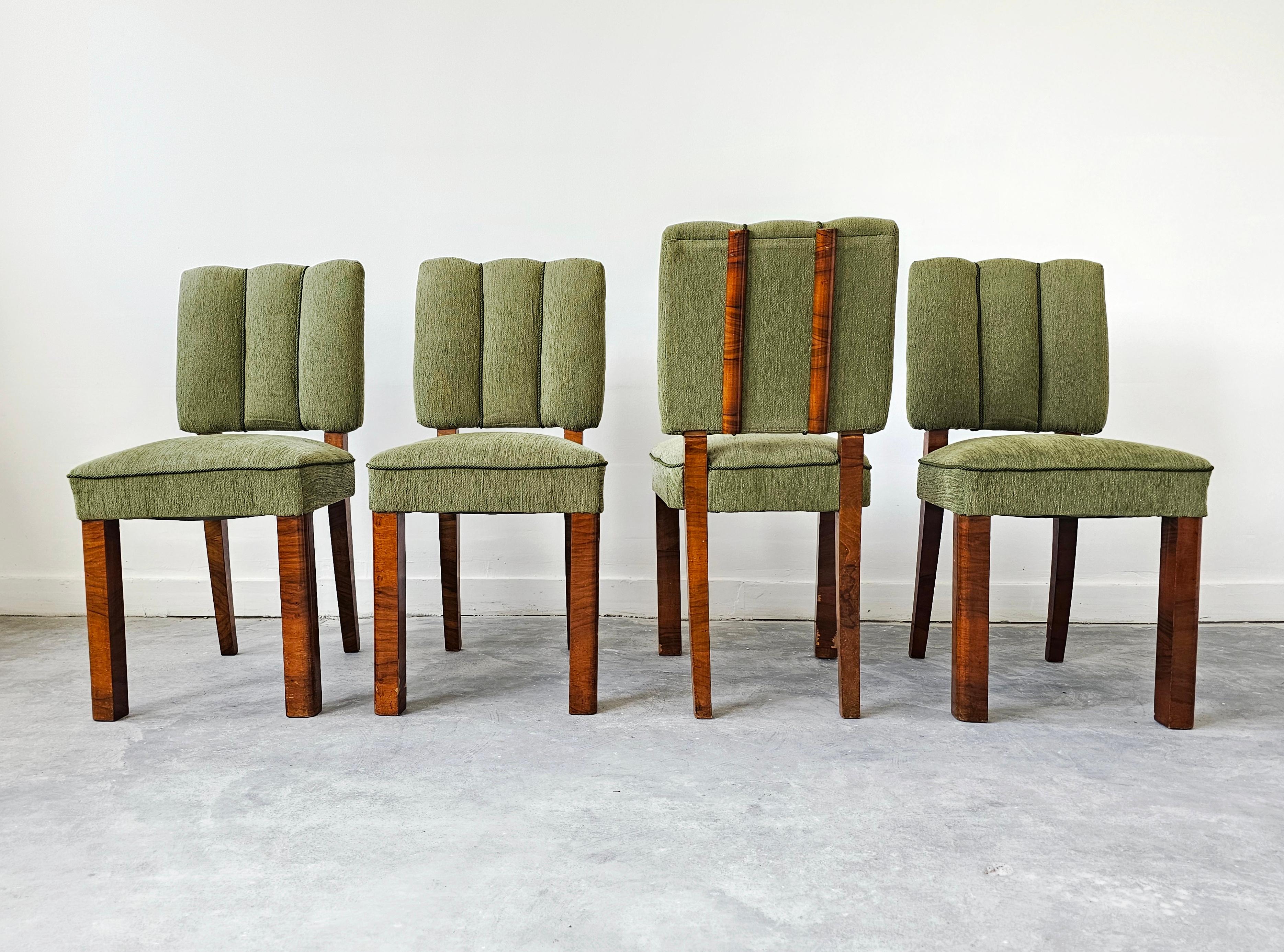 In this listing you will find a set of 4 Art Deco Dining chairs. Chairs feature exceptionally attractive and rare design, and they are done in solid walnut, with walnut root veneer, upholstered in vintage velvet some years back. Walnut roots