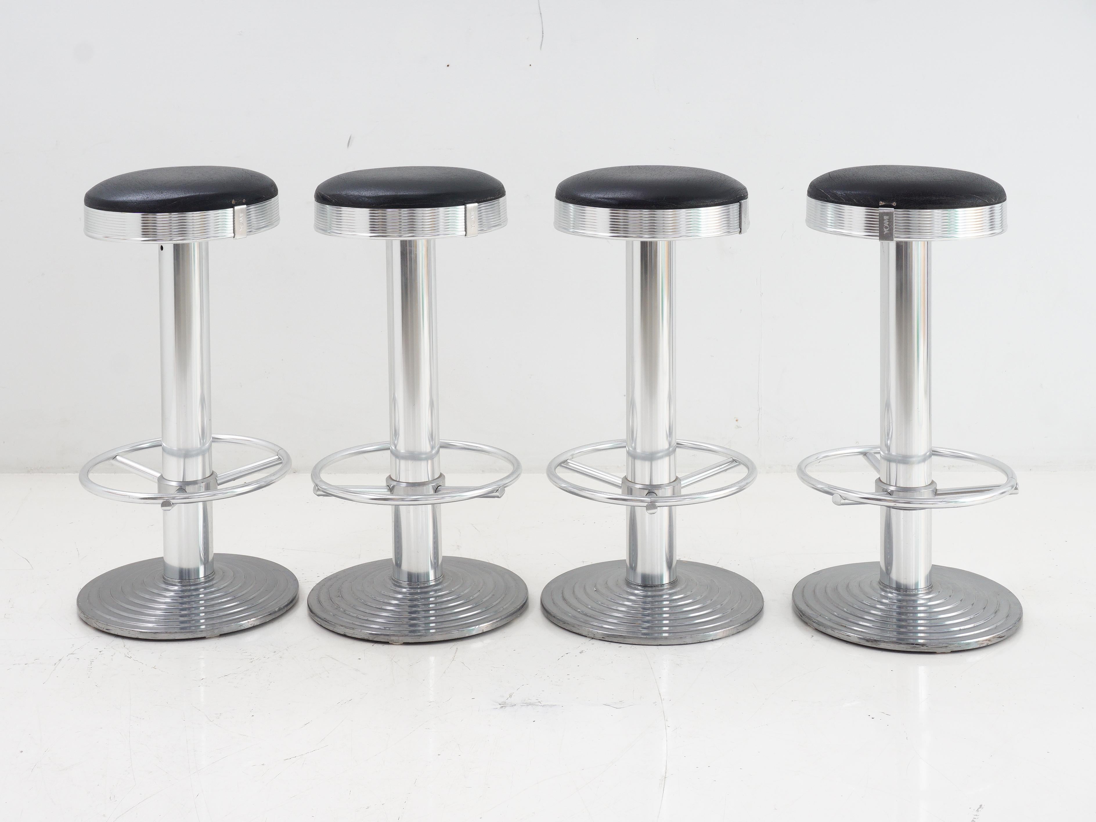 Raise the bar with these vintage Art Deco style barstools, where every seat is a work of functional art. These chrome and leather stools bring a sense of nostalgia to your modern-day gatherings. Step up your barstool game to a higher level of