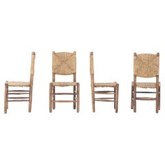 Ensemble de 4 chaises en frêne et paille de 1950