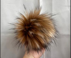 Satz mit 4 sortierten Pompons