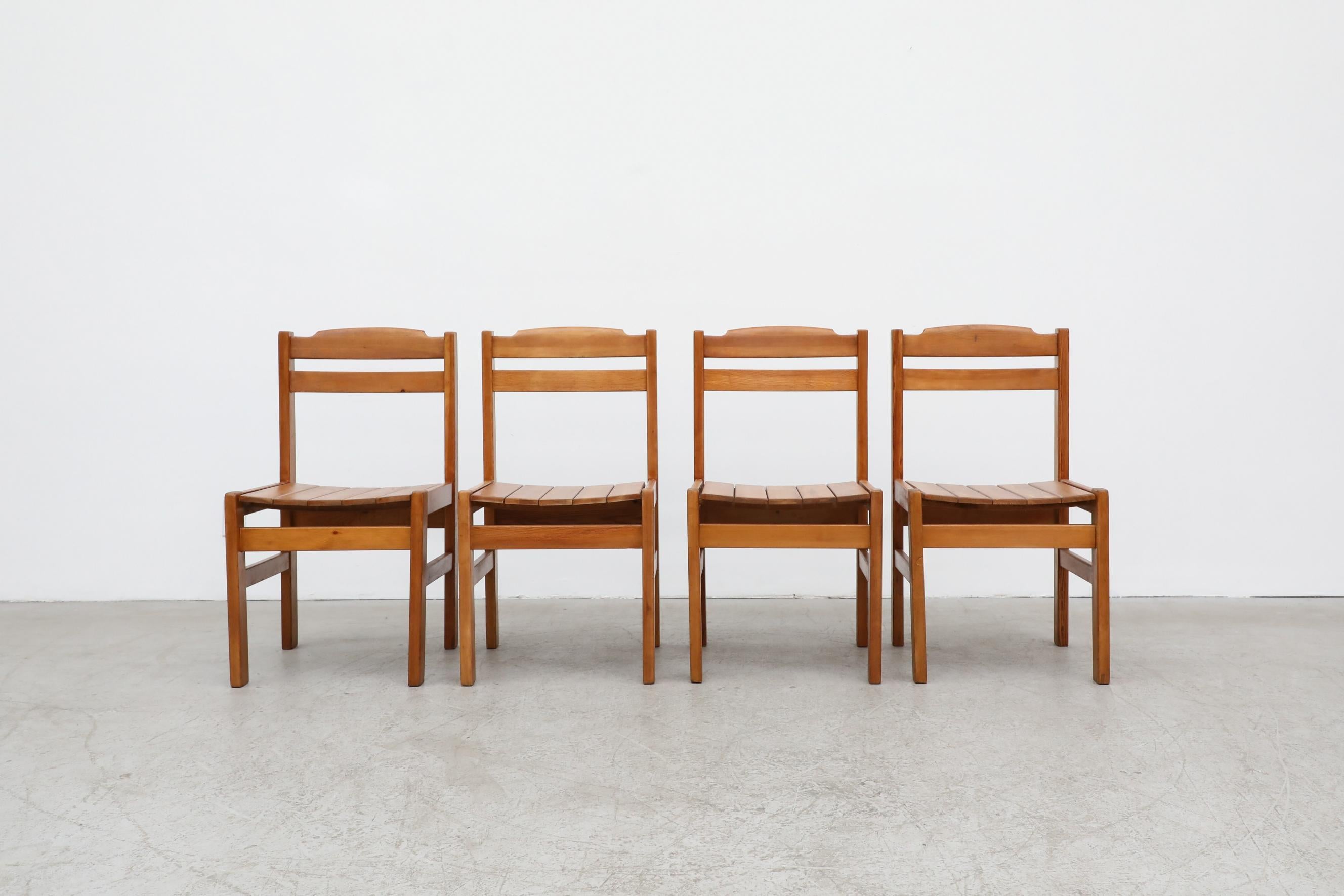 Set of 4 pine side chairs designed in the style Ate van Apeldoorn featuring a lovely little detail on the top backrest five pine slats for the seating. The set is in original condition with wear consistent with their age and use. Set Price.
