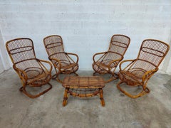 Set of 4 rattan armchairs and a coffee table by Tito Agnoli for Bonacina - Italy