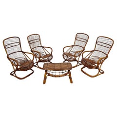 Set of 4 rattan armchairs and a coffee table by Tito Agnoli for Bonacina - Italy