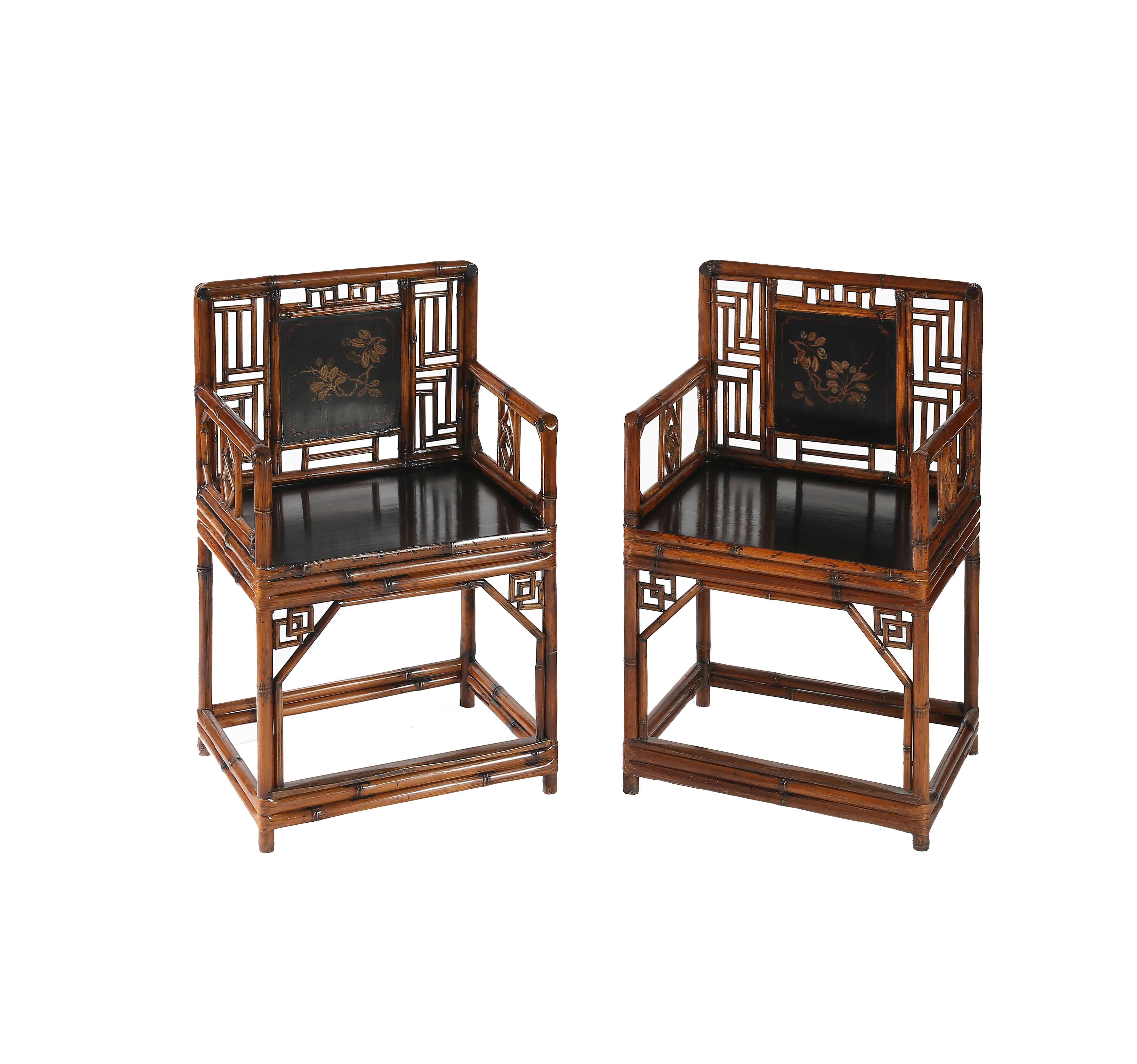 Fine set of bamboo armchairs

The rectangular back decorated with lattice panels enclosing a black lacquered solid panel with gilt floral painting, the arm steam-bent to form the support for the hand rest with a lattice panel support under the mid