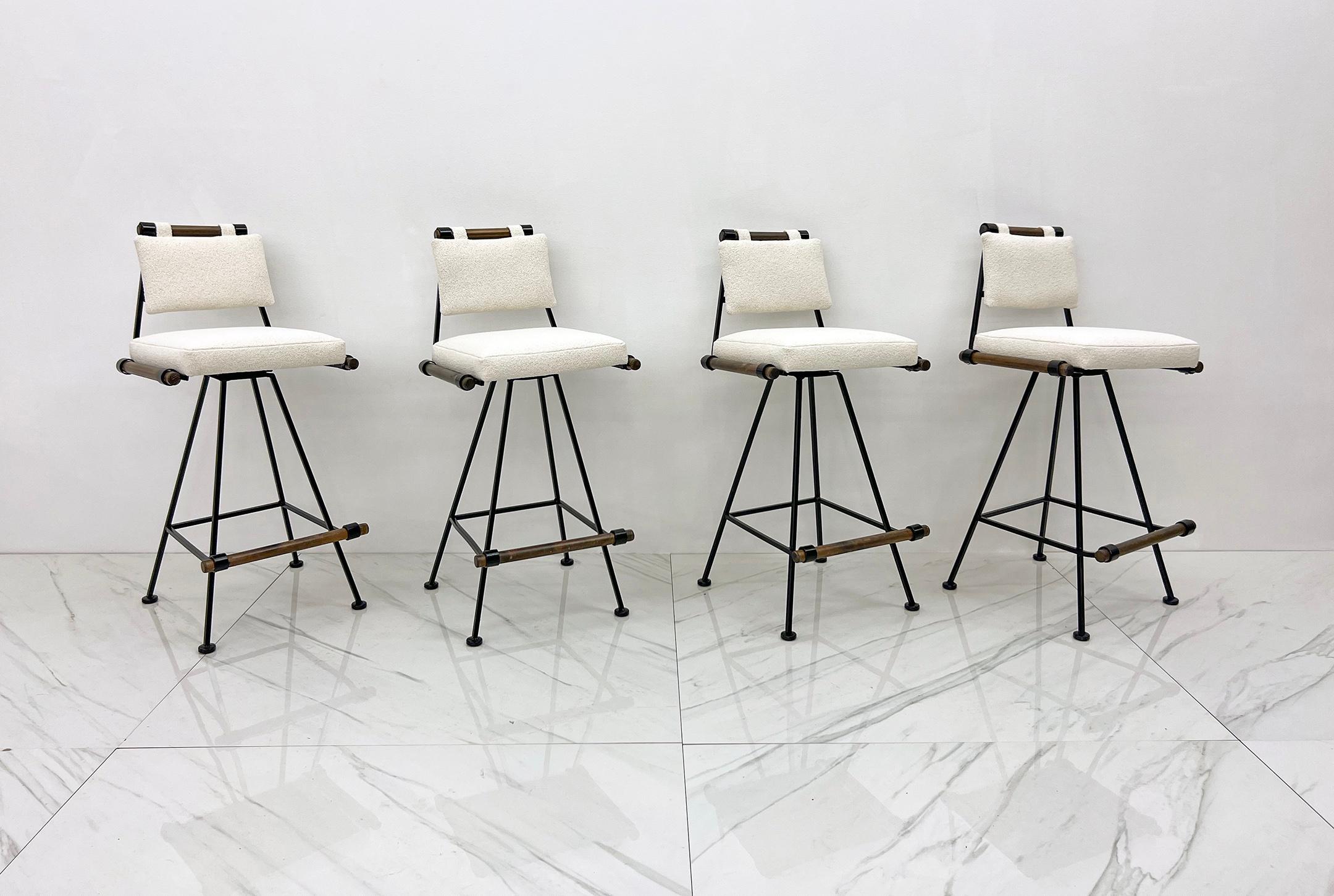 These mid-century bar stools are absolutely stunning. In the manner of Californian designer Cleo Baldon (often attributed to Cleo Baldon), there are several iterations of these stools and chairs that were designed for Terra and Inca. These stools