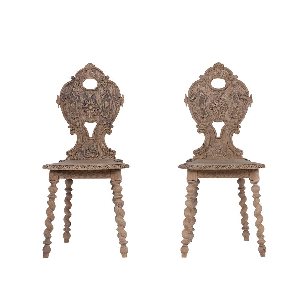Step into a world of historical elegance with our set of four Late 19th-century Baroque Side Chairs, showcasing the perfect fusion of artistic craftsmanship and practicality. These chairs are expertly crafted from oakwood and feature a sophisticated