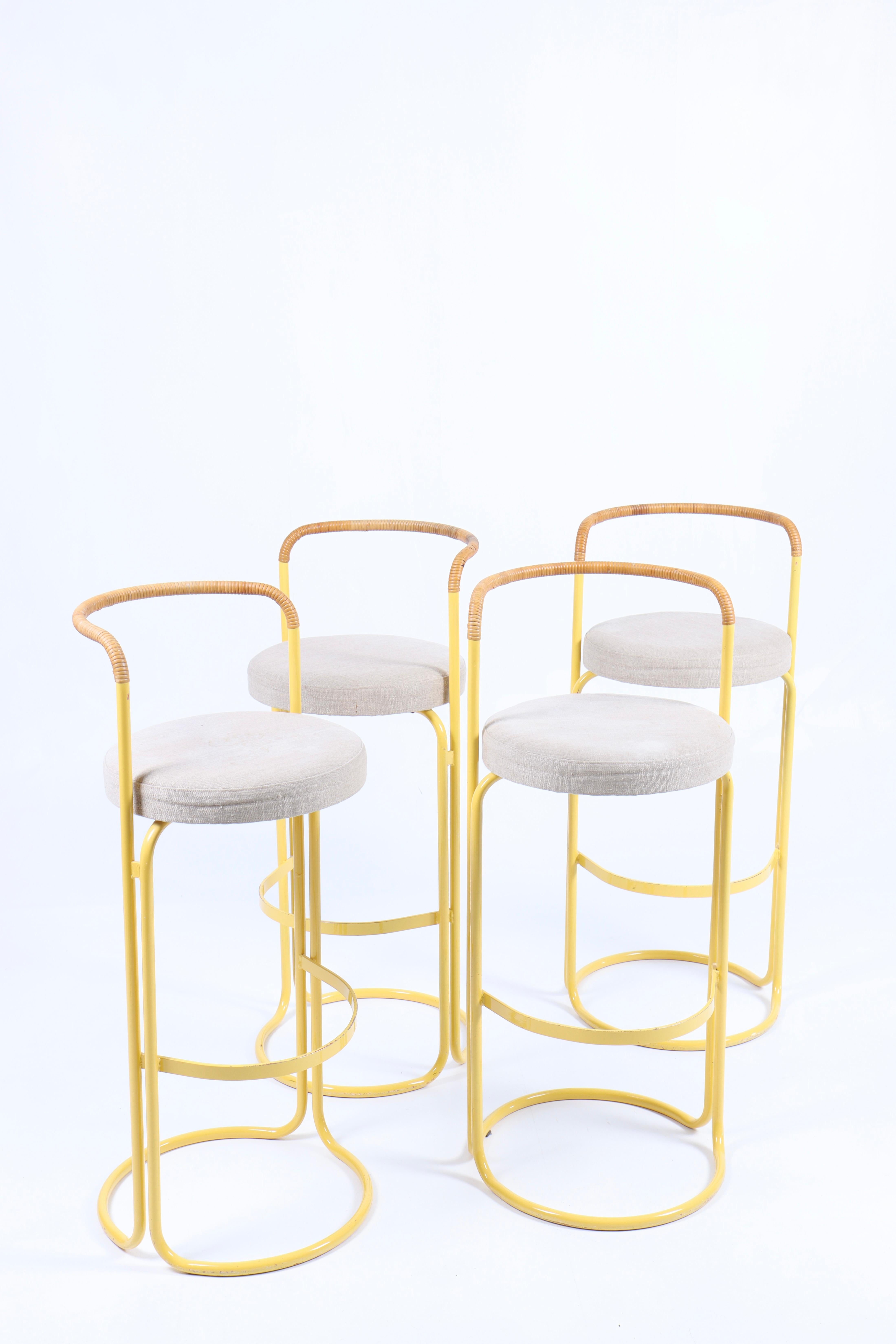 Set of 4 barstools in yellow metal, cane and canvas. Designed by Poul Nørreklit for Georg Petersens Møbelfabrik. Great condition.