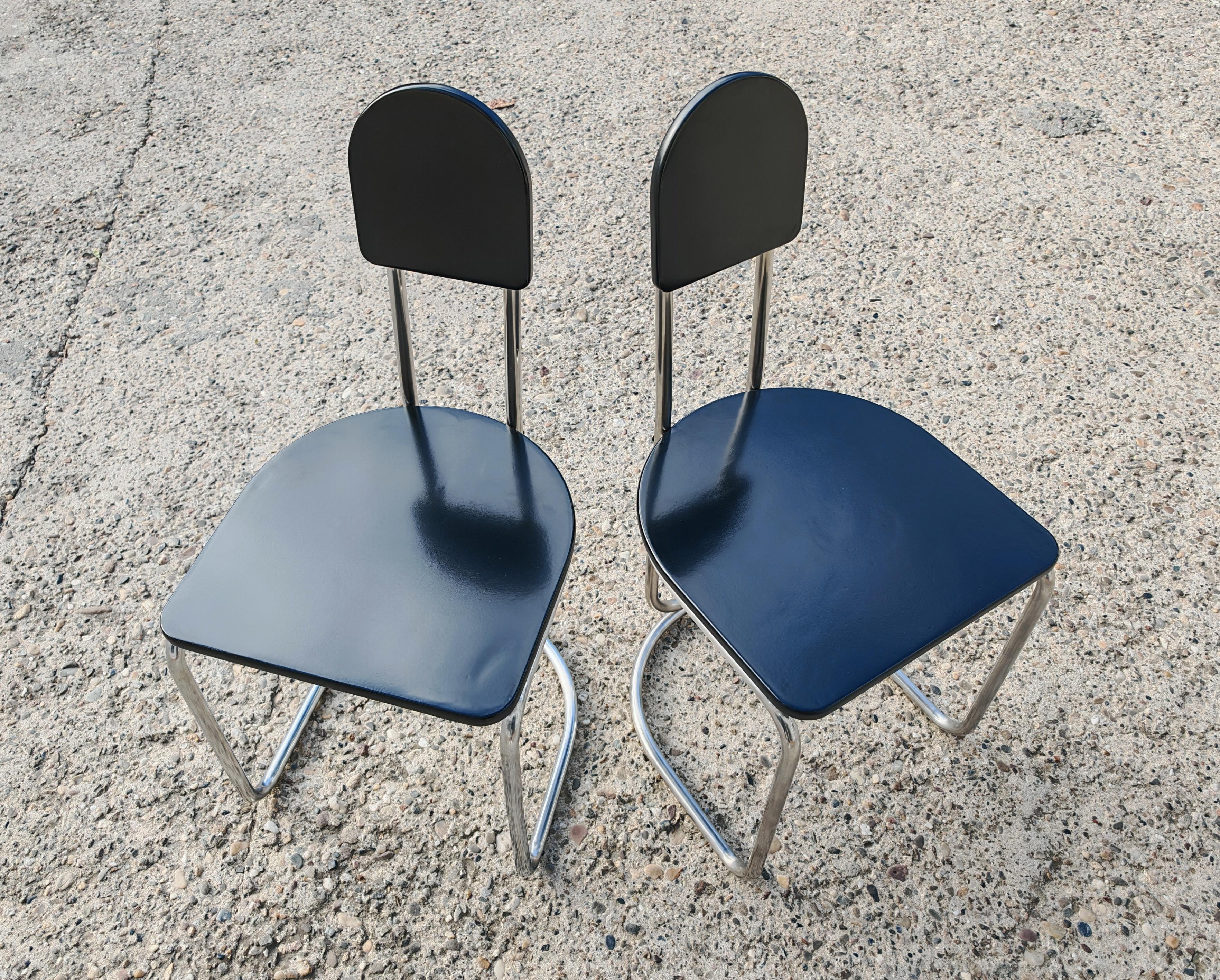 German Set of 4 Bauhaus Chairs with tubular steel frames and black lacquer wood seats For Sale