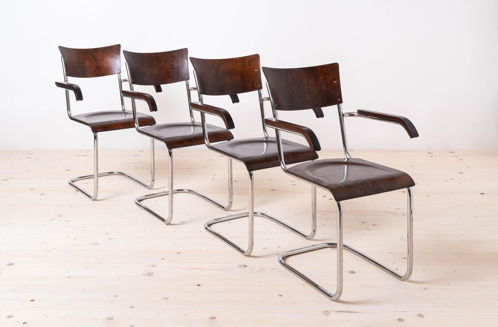 This gorgeous set of four Bauhaus dining chairs originally designed by the renowned Mart Stam in the 1920s-1930s era, has undergone a meticulous restoration process. The wooden elements have been expertly cleaned and refinished with high quality