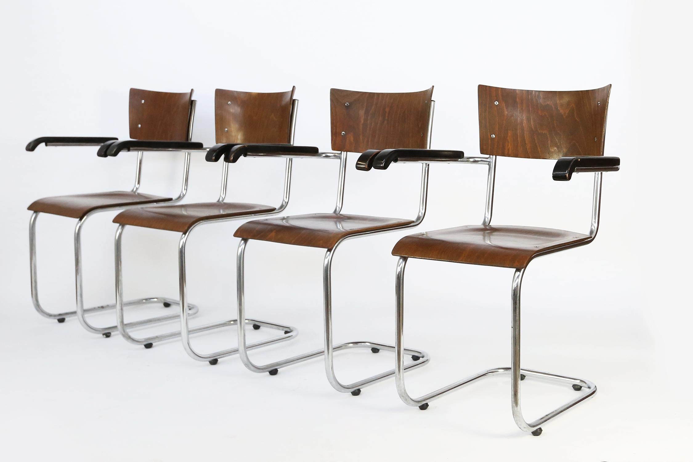 A set of 4 bauhaus cantilever armchairs designed in late 1920s, simultaneously, by Mart Stam, Marcel Breuer and Ludwig Mies van der Rohe.
These ones, by Mart Stam for Thonet features a frame in chrome-plated tubular metal in original condition and