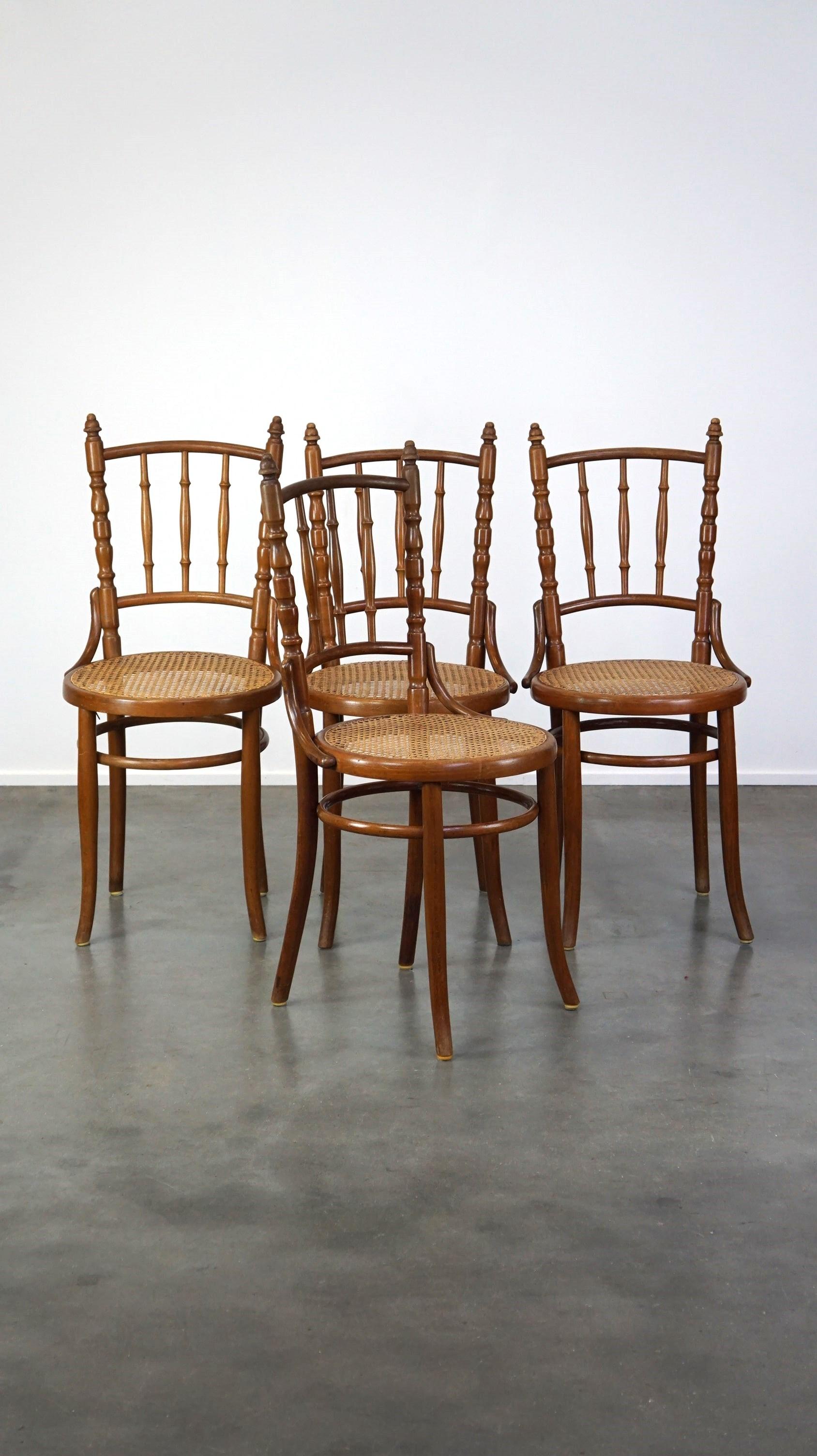 Offered this set of 4 beautiful and atmospheric vintage Thonet design bistro chairs.

This great set of bistro chairs show their age in a positive and charming way which contributes to their great appearance. These elegant chairs look great in both