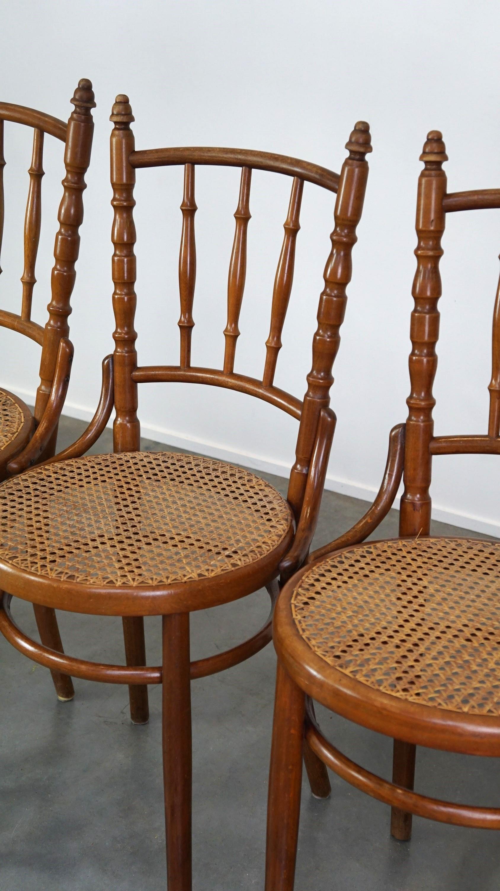 Austrian Set of 4 beautiful and atmospheric vintage Thonet design bistro chairs For Sale