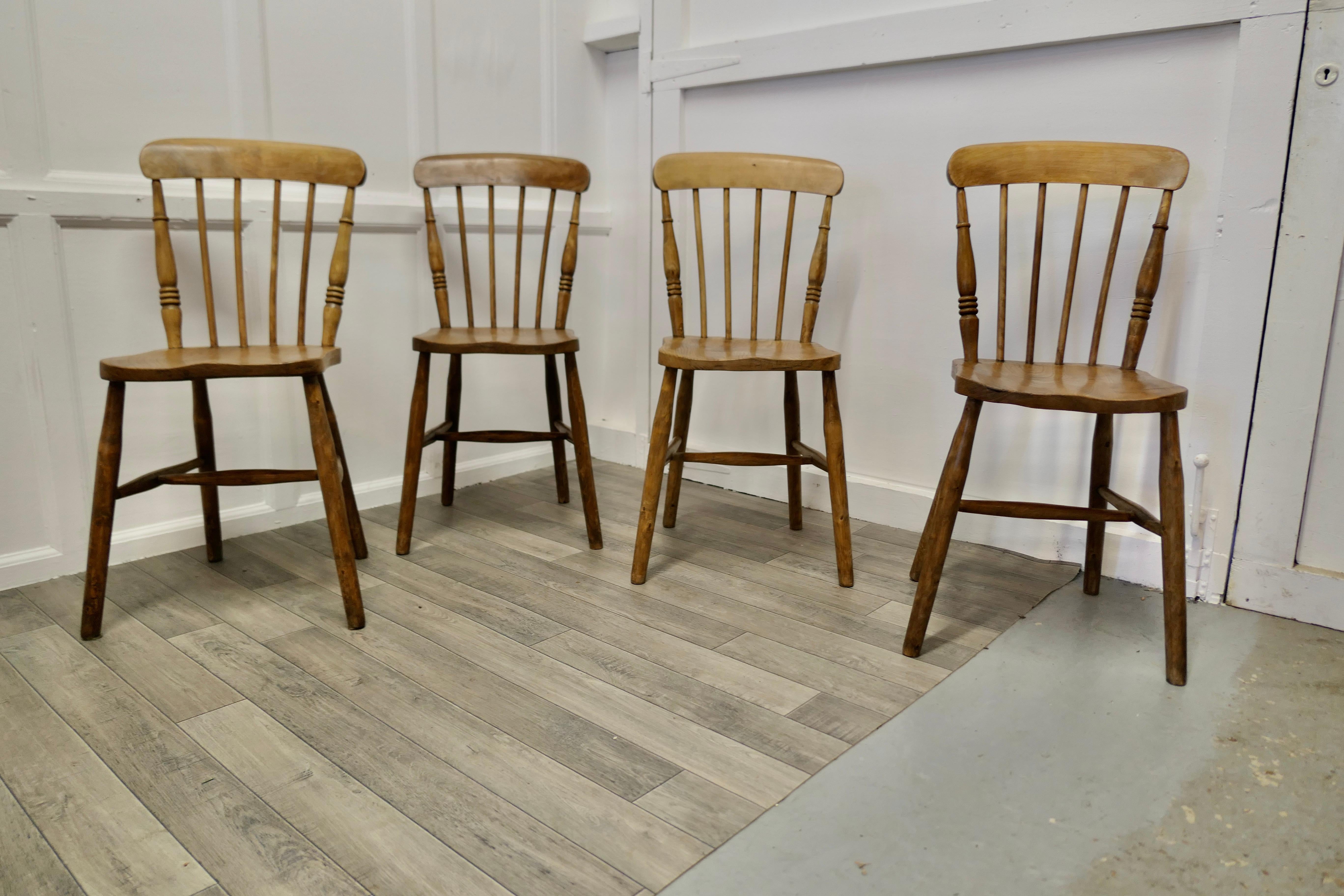 Set of 4 beech and elm seated stick back kitchen dining chairs.


The chairs are a classic design and traditionally made from solid wood they have a curved top rail back in the traditional style with spindles. 
These are a good set of chairs,