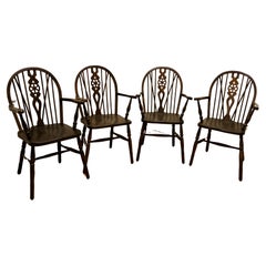 Antique Set of 4 Beech and Elm Wheel Back Carver Chairs    