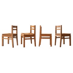 Ensemble de 4 chaises de salle à manger belges modernistes du milieu du siècle en chêne et paille années 1960