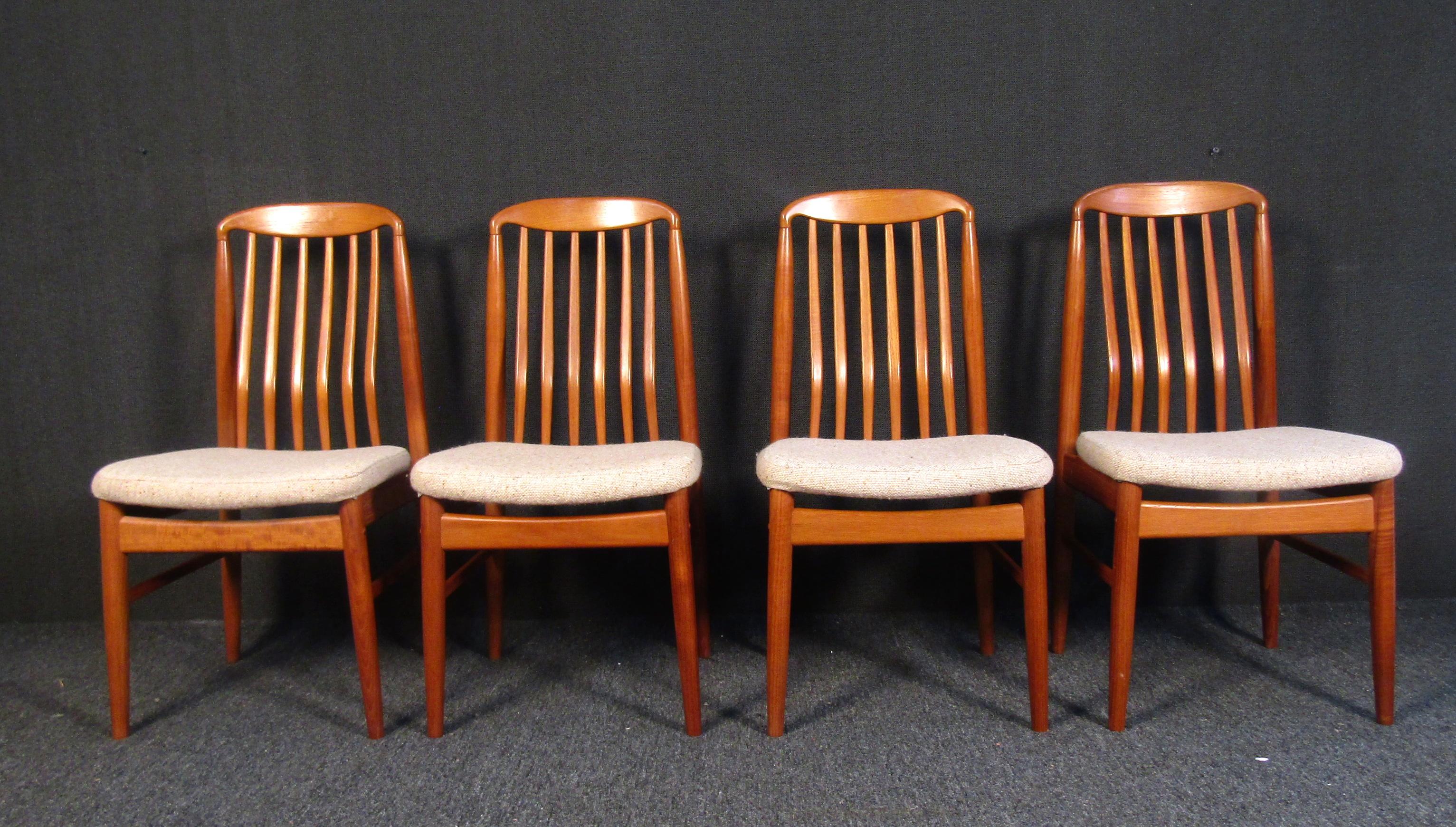 Gorgeous teak dining chairs sturdily constructed with handsome joinery showcased on the frames, covered in a vintage beige upholstery. Sure to make a great addition to any modern interior. 

Please confirm item location with dealer (NJ or NY).