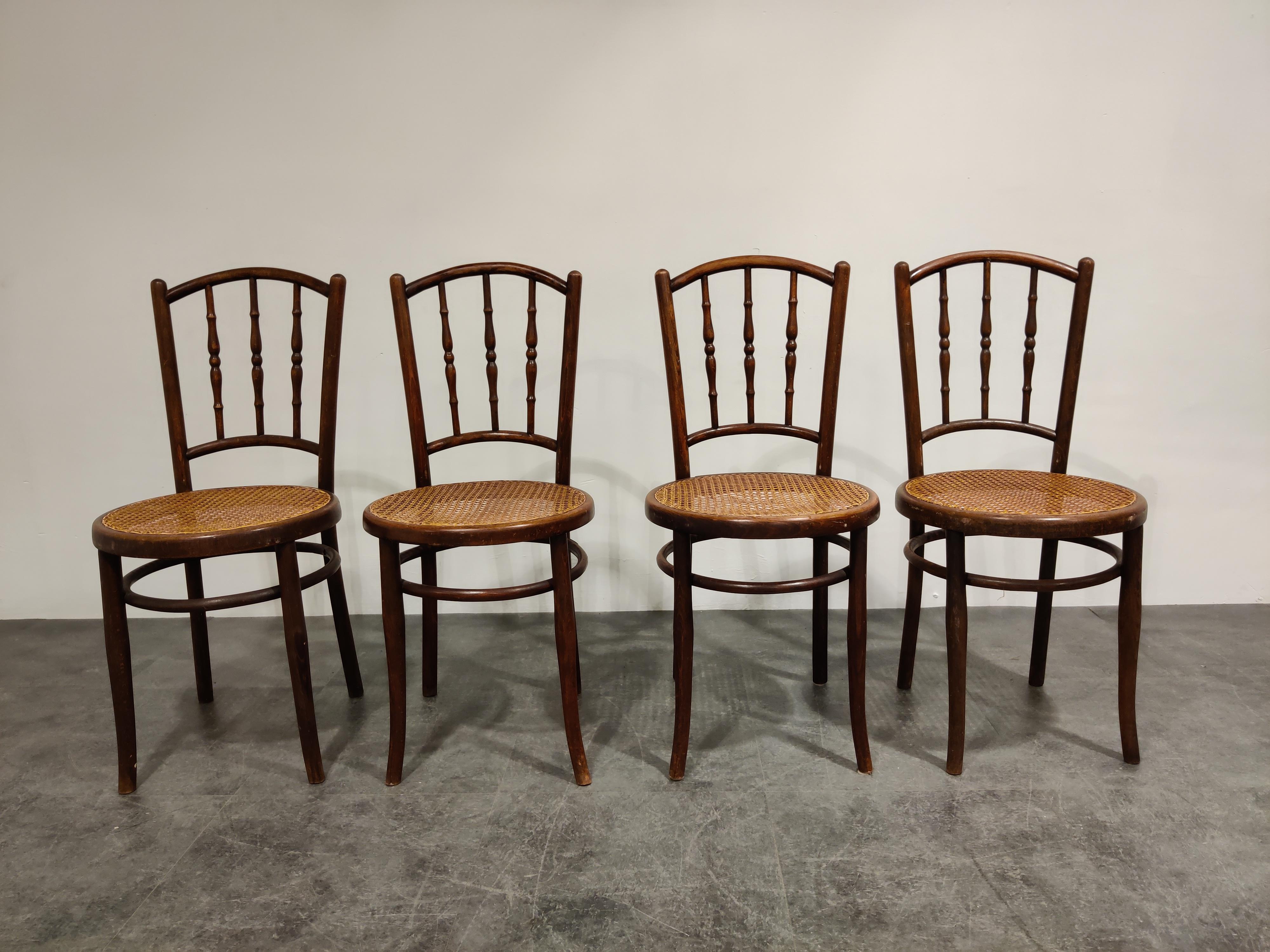 Set of 4 bentwood bistro chairs. 

This chairs were made in the 1920s by Jacob U. Josef Kohn.

As you can see in the pictures, the chairs are very similar to the famous 'Thonet' chairs.

1920s, Austria

The chairs are marked at the bottom.