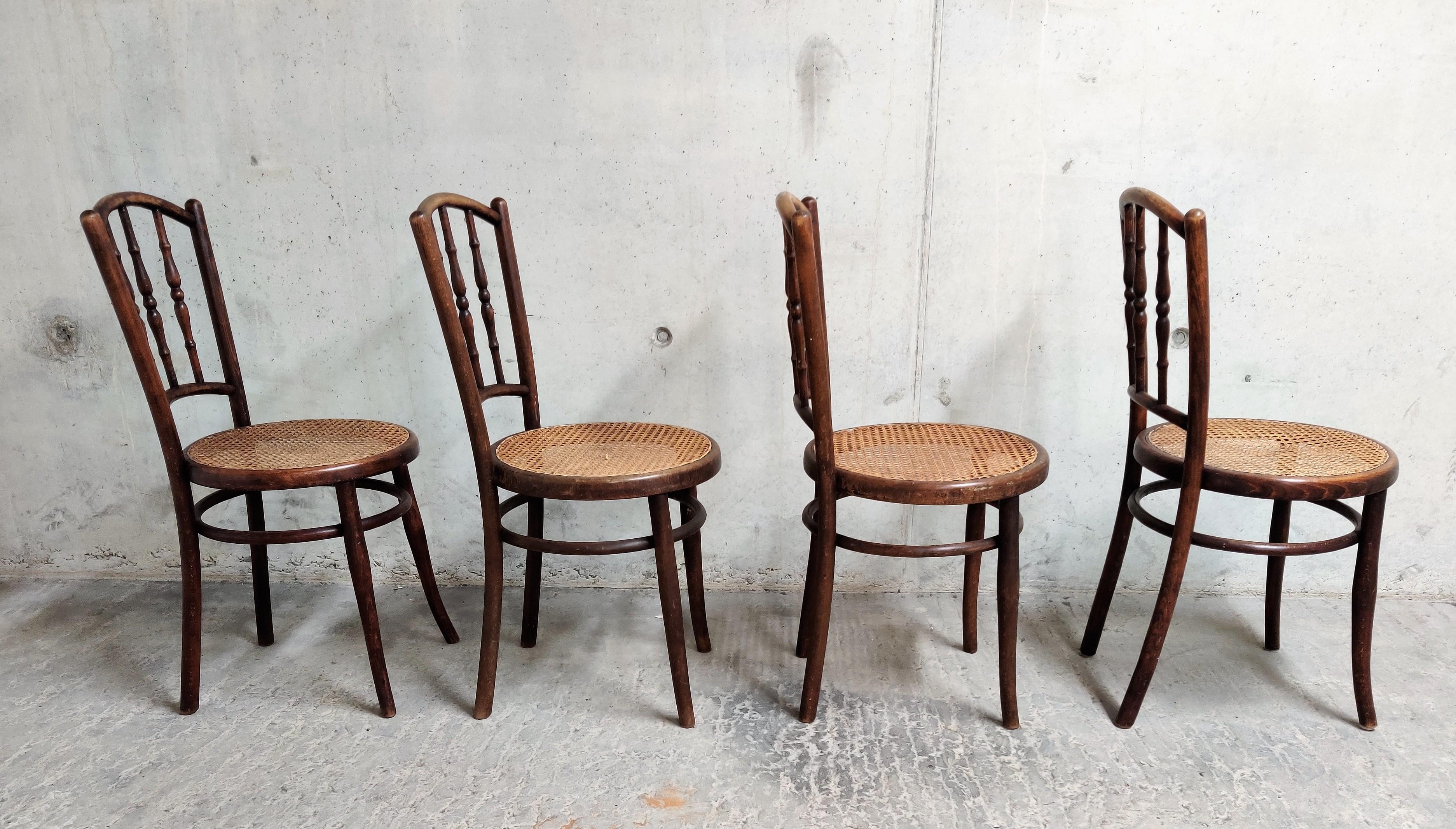Set of 4 unique bentwooden dining chairs. 

This chairs were made in the 1920s by Jacob U. Josef Kohn.

As you can see in the pictures, the chairs are very similar to the famous 'Thonet' chairs.

1920s, Austria

The chairs are marked at the