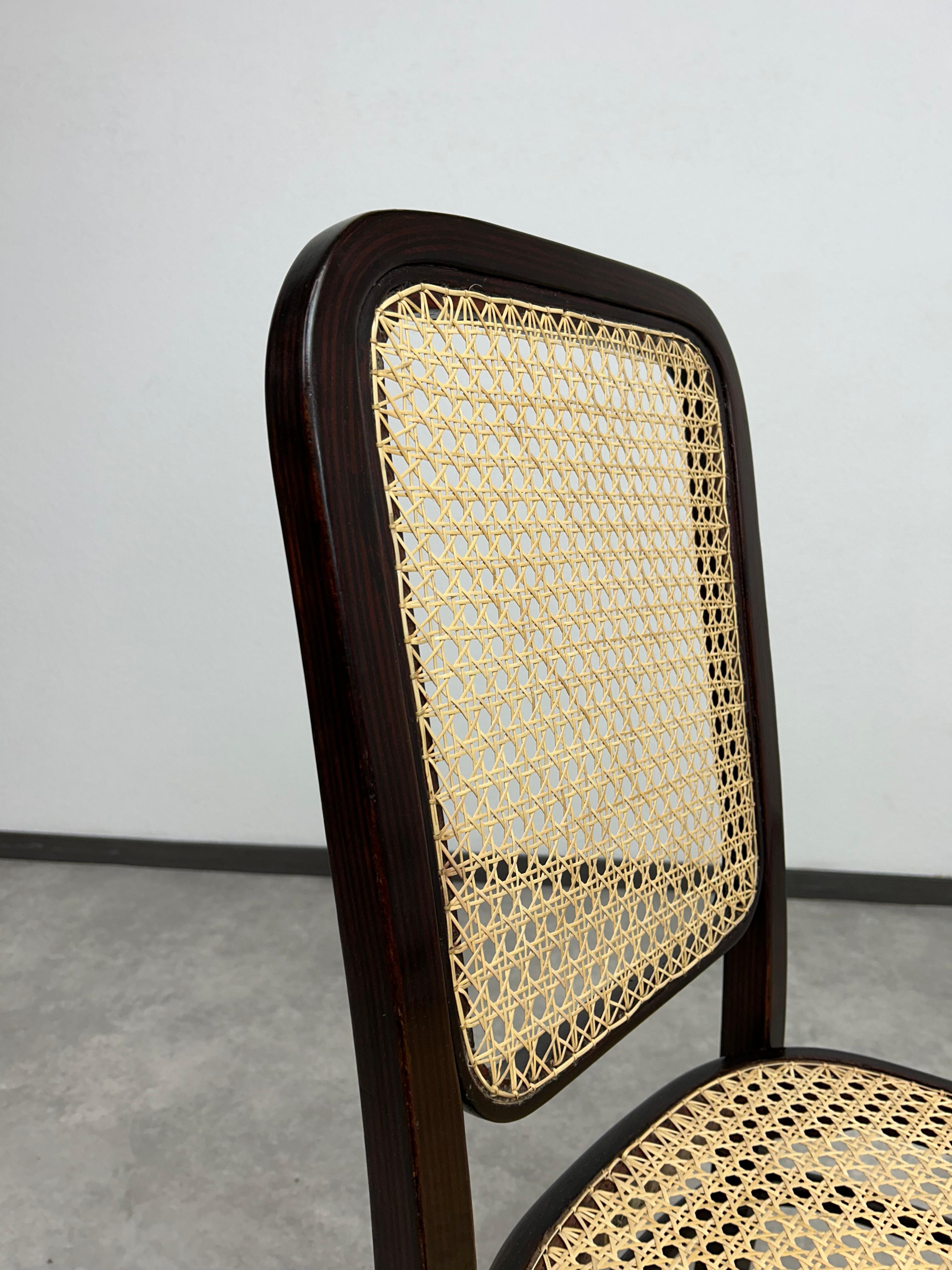 Rattan Set of 4 bentwood dining room chairs by Thonet For Sale