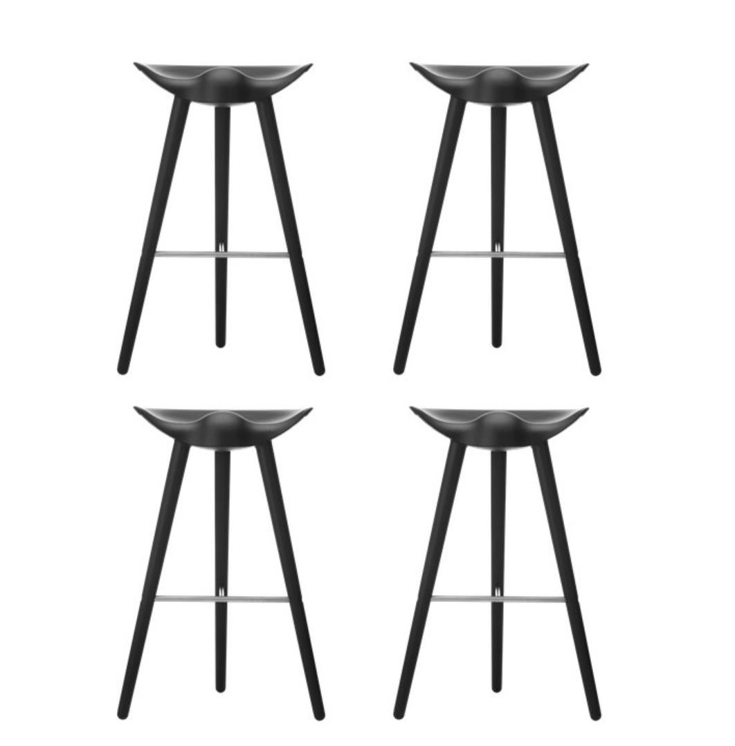 Set Of 4 Black Beech and Stainless Steel Bar Stools by Lassen
Dimensions: H 77 x W 36 x L 55.5 cm
Materials: Beech, Stainless Steel

In 1942 Mogens Lassen designed the Stool ML42 as a piece for a furniture exhibition held at the Danish Museum of