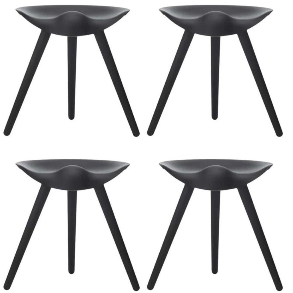 Set of 4 ML 42 black beech stools by Lassen
Dimensions: H 48 x W 36 x L 55.5 cm
Materials: Beech

In 1942 Mogens Lassen designed the stool ML42 as a piece for a furniture exhibition held at the Danish Museum of Decorative Art. He took inspiration