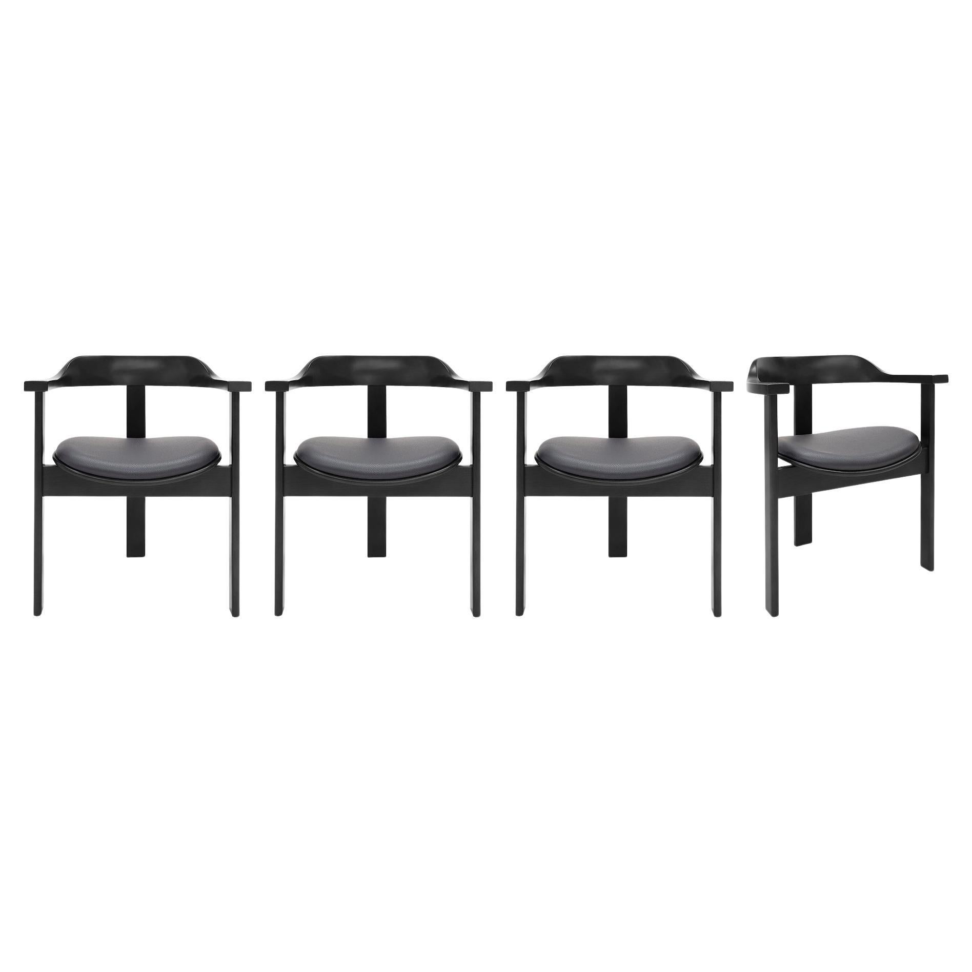 Ensemble de 4 fauteuils Haussmann noirs par Robert & Trix Haussmann, Design 1964