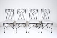 Lot de 4 chaises de salle à manger en fer noir, vers 1980