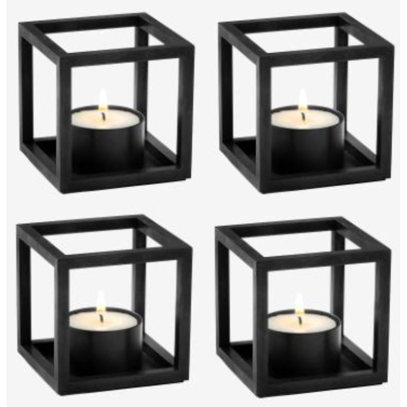 Set of 4 black kubus T candle holders by Lassen
Dimensions: D 7 x W 7 x H 7 cm 
Materials: Metal 
Also available in different dimensions and colors. 
Weight: 0.40 Kg

The tealight, Kubus T, is added to the Kubus collection in 2018, designed by
