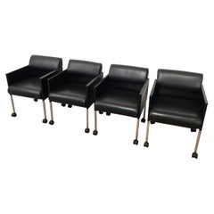 Set di 4 poltrone laccate nere e in pelle con rotelle di Rosenthal. Cir 1970