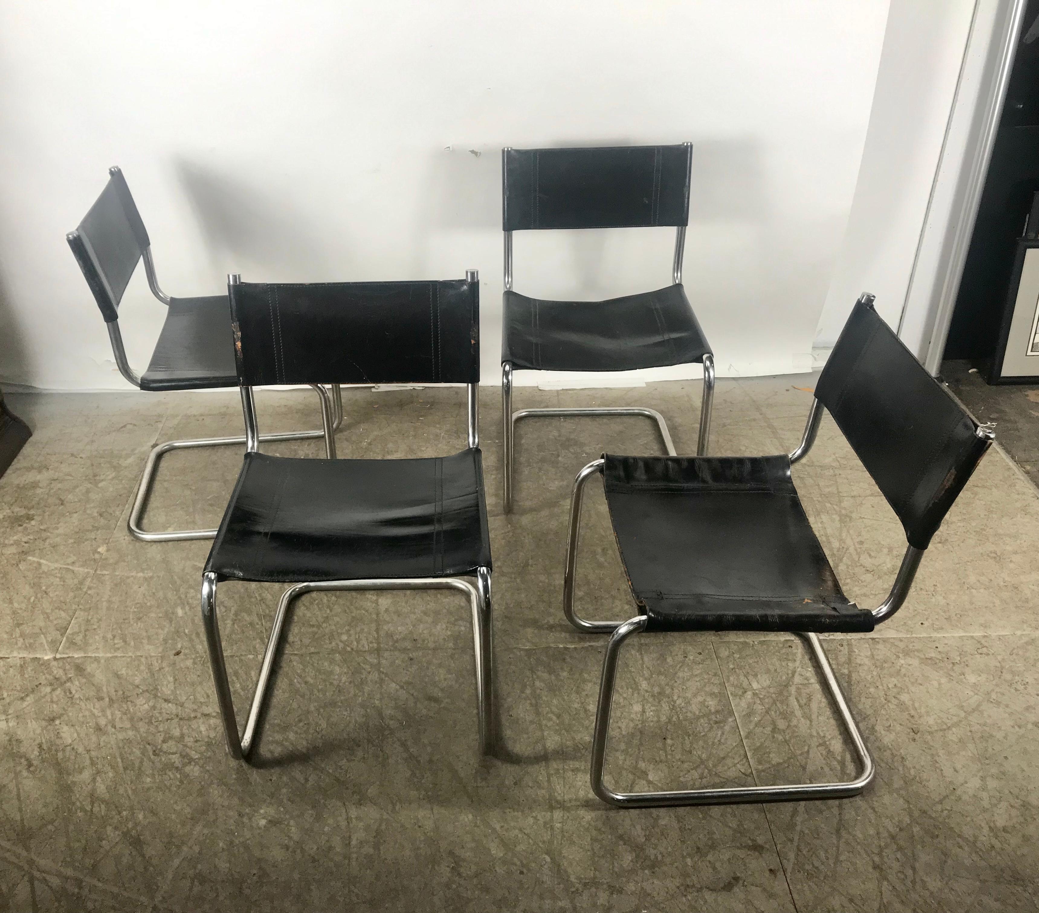 Stunning set of 4 black leather and Chrome Bauhaus style side chairs (dining) after Mart Stam, Single piece continuous bended chrome pipe, leather slinged seat and backrest, One chair reinforced repair,, one chair leather torn to underside, (out for