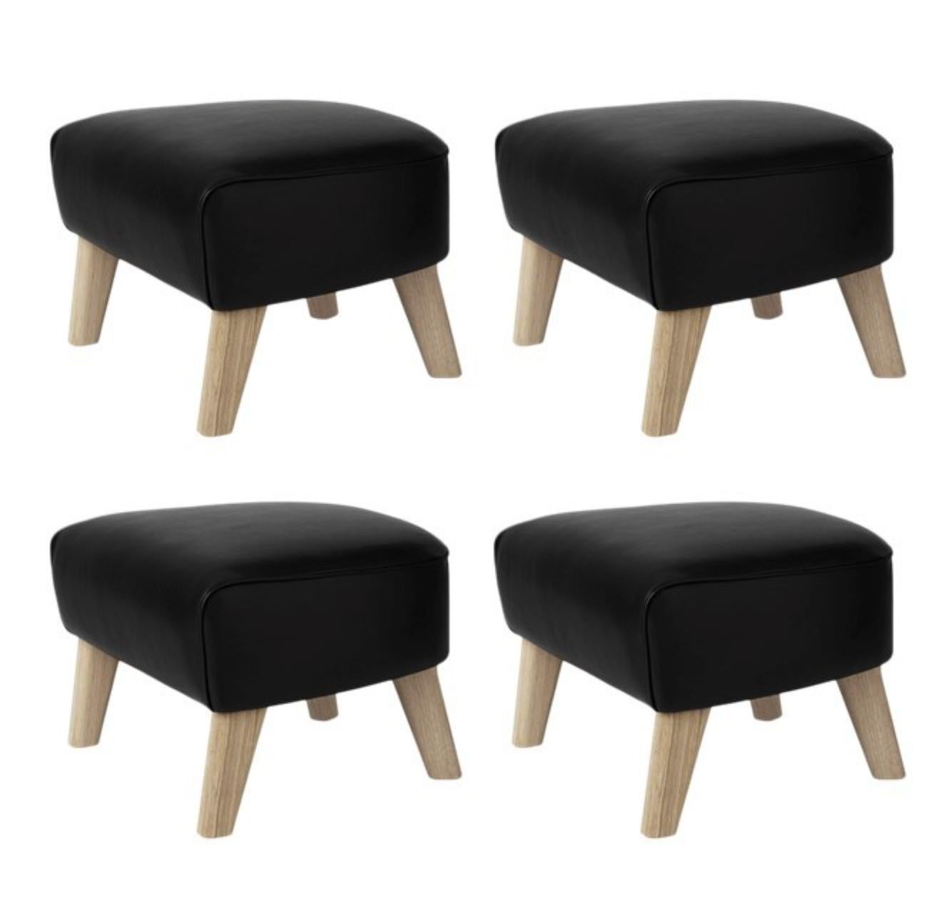 Set of 4 black leather and natural oak my own chair footstools by Lassen
Dimensions: W 56 x D 58 x H 40 cm 
Materials: Leather, oak

The my own chair Footstool has been designed in the same spirit as Flemming Lassen’s original iconic chair,