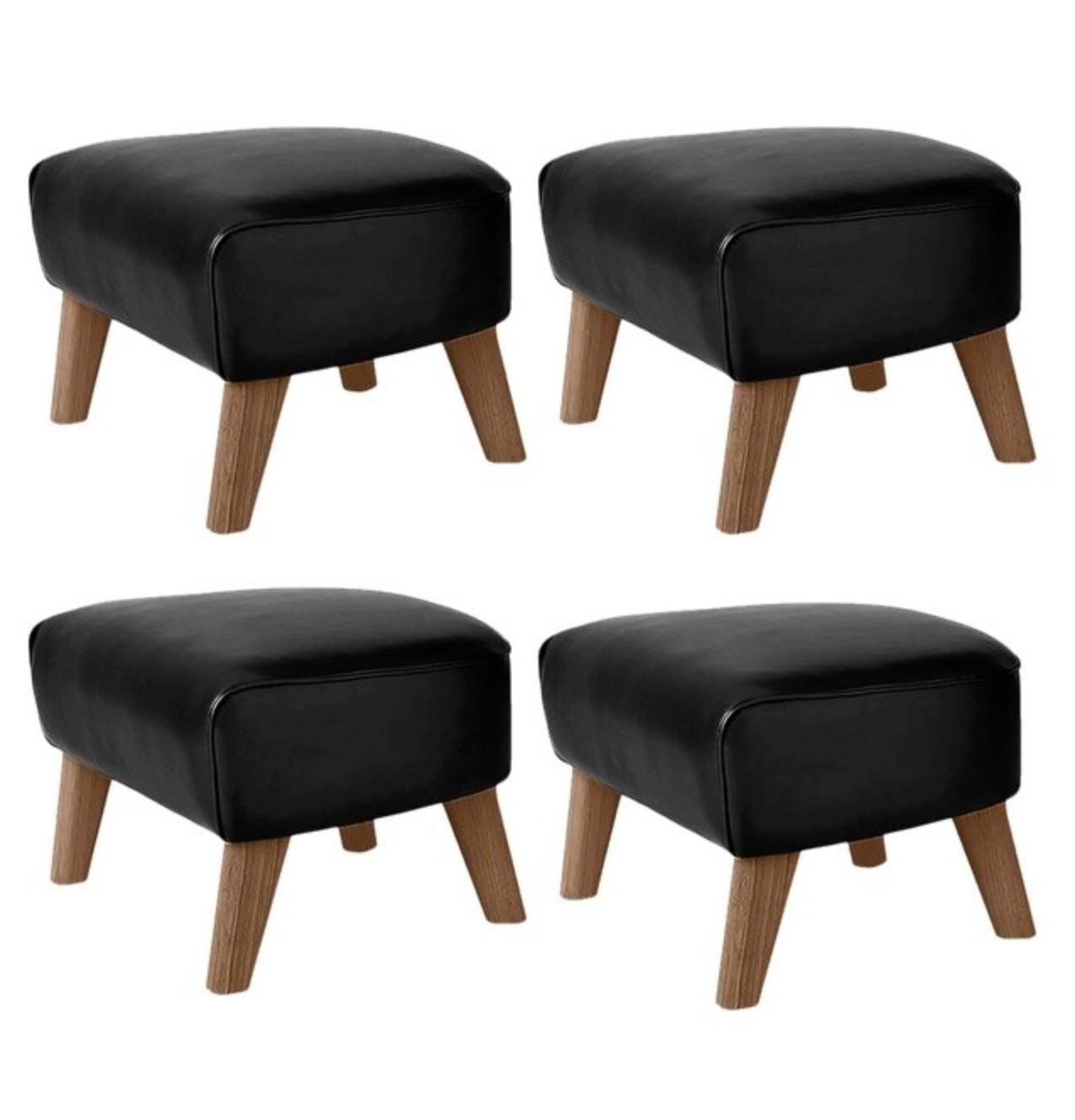 Set Of 4 Black Leather and Smoked Oak My Own Chair Footstools by Lassen
Dimensions: W 56 x D 58 x H 40 cm 
Materials: Leather

The My Own Chair Footstool has been designed in the same spirit as Flemming Lassen’s original iconic chair, reflecting