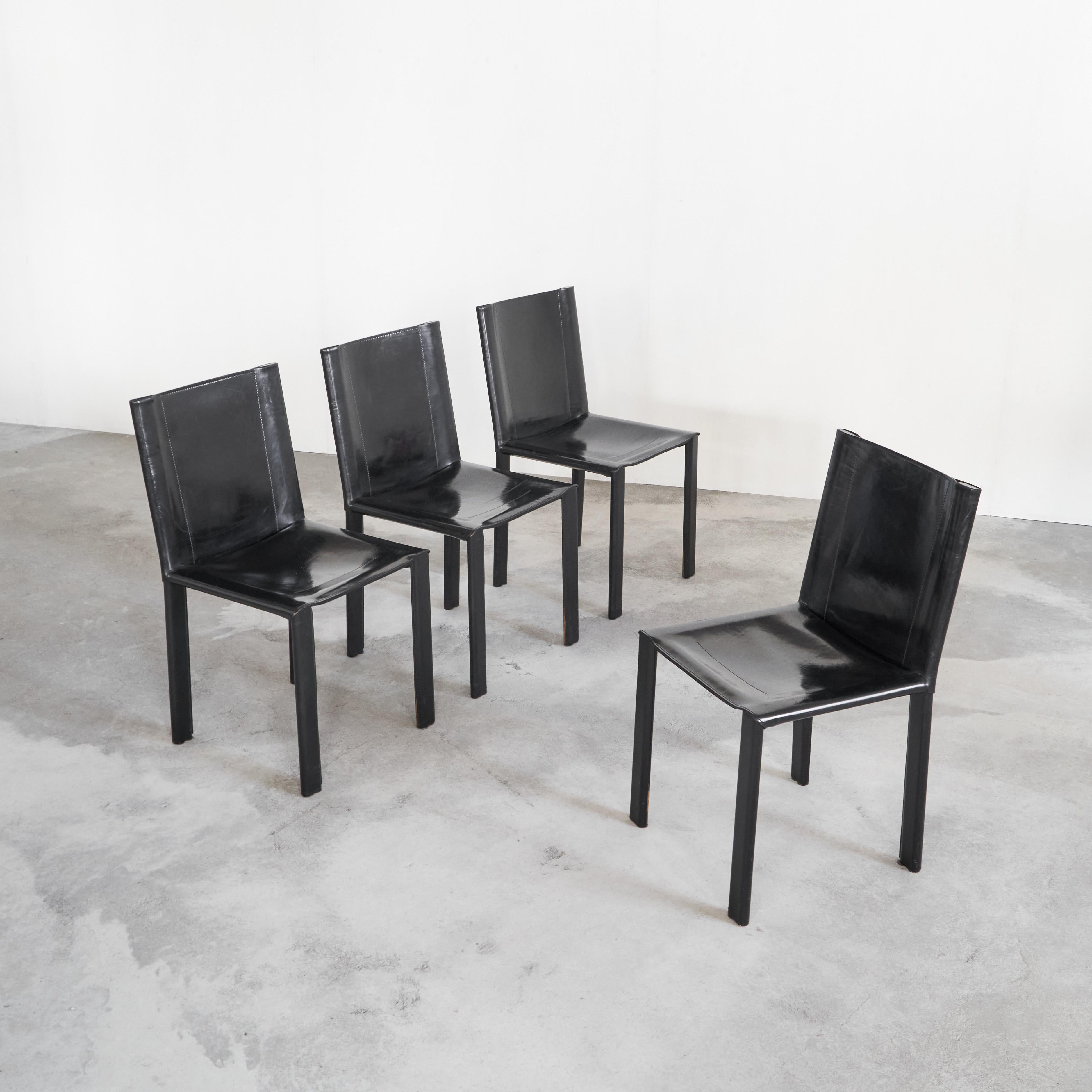 Set of 4 Black Leather Chairs by Matteo Grassi, Italy, 1990s.

A wonderful high quality set of four Matteo Grassi chairs with beautiful patinated black saddle leather. Resembles the famous CAB chairs by Bellini in the way they look and in the way